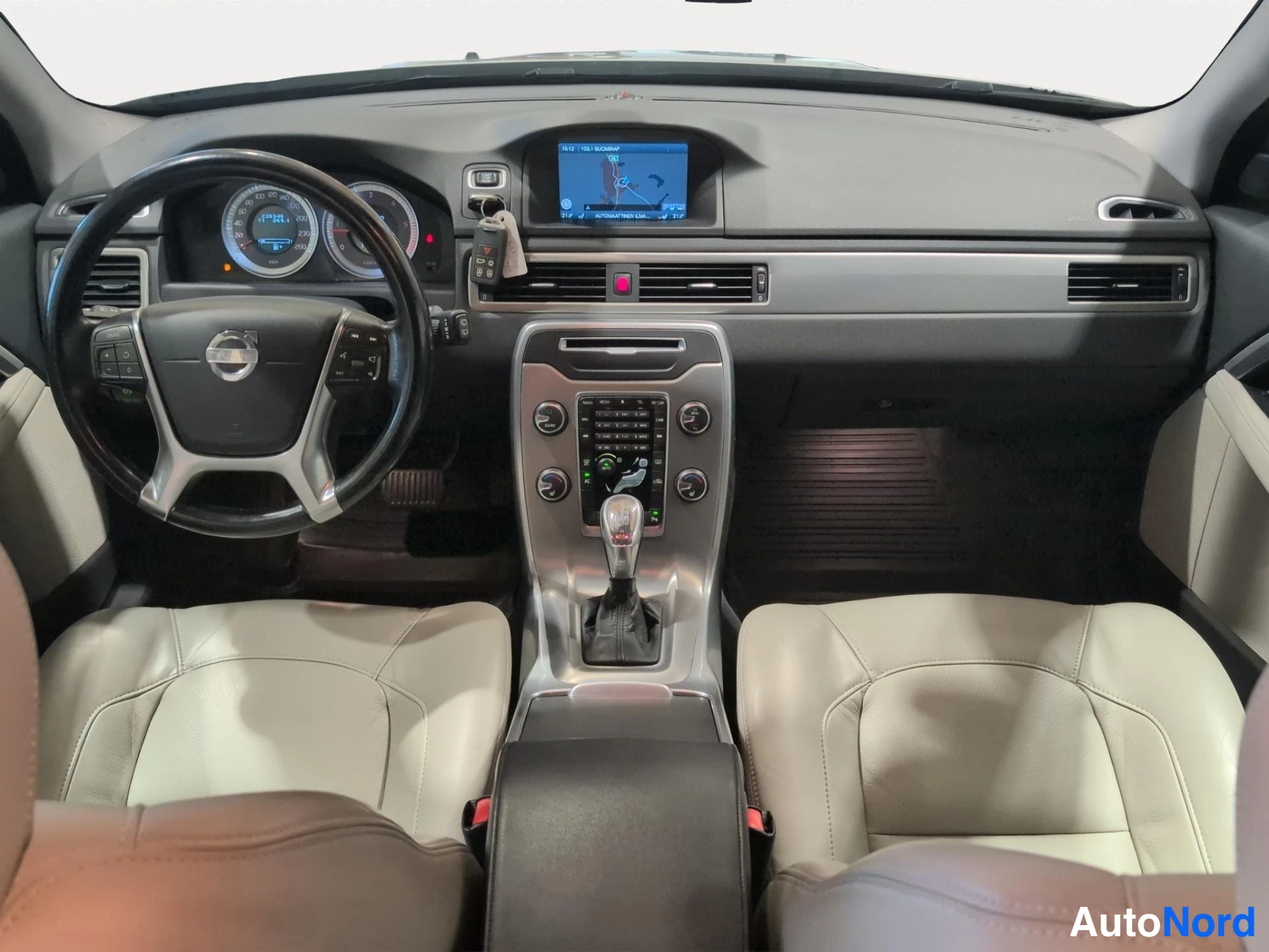 Ruskea Volvo V70 2013, kuva 7