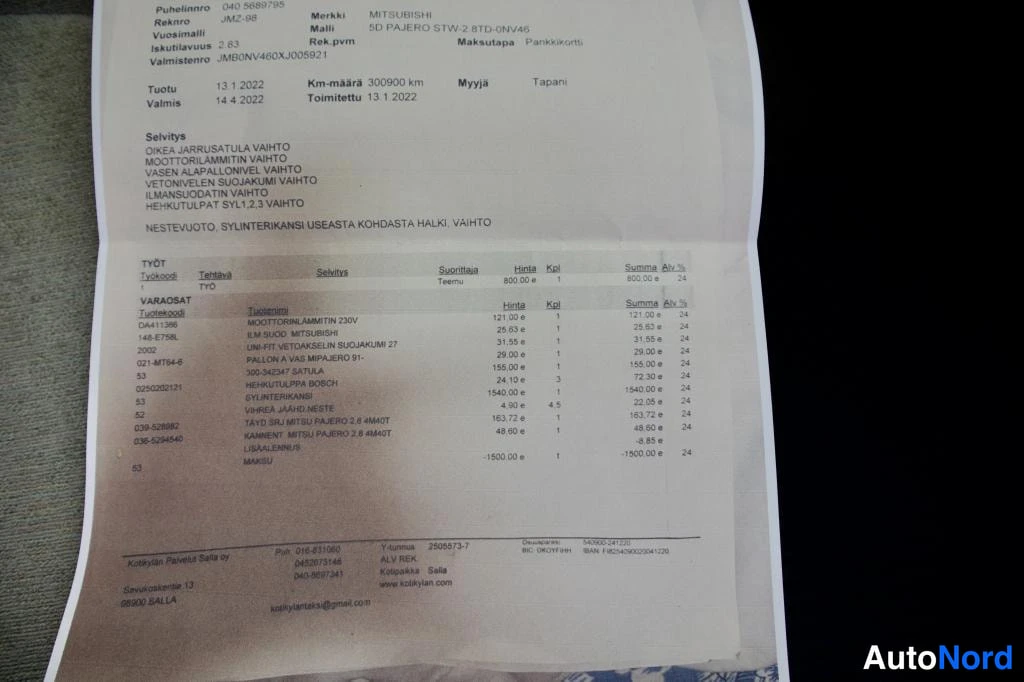 Muu: Korjaamolasku tai työtodistus Mitsubishi Pajerolle (5D PAJERO STW 2.8 TD-ONV46), josta näkyvät tuotu/valmis-päivämäärät 13.1.2022, ajomäärä 300900 km ja varaosi