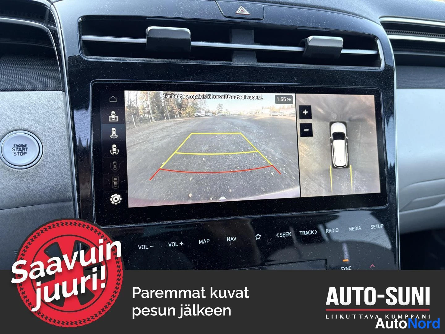 Muu: Hyundai Tucsonin kosketusnäyttö näyttää pysäköintikameran kuvan ja ympäriview -monitorin auton yläpuolelta