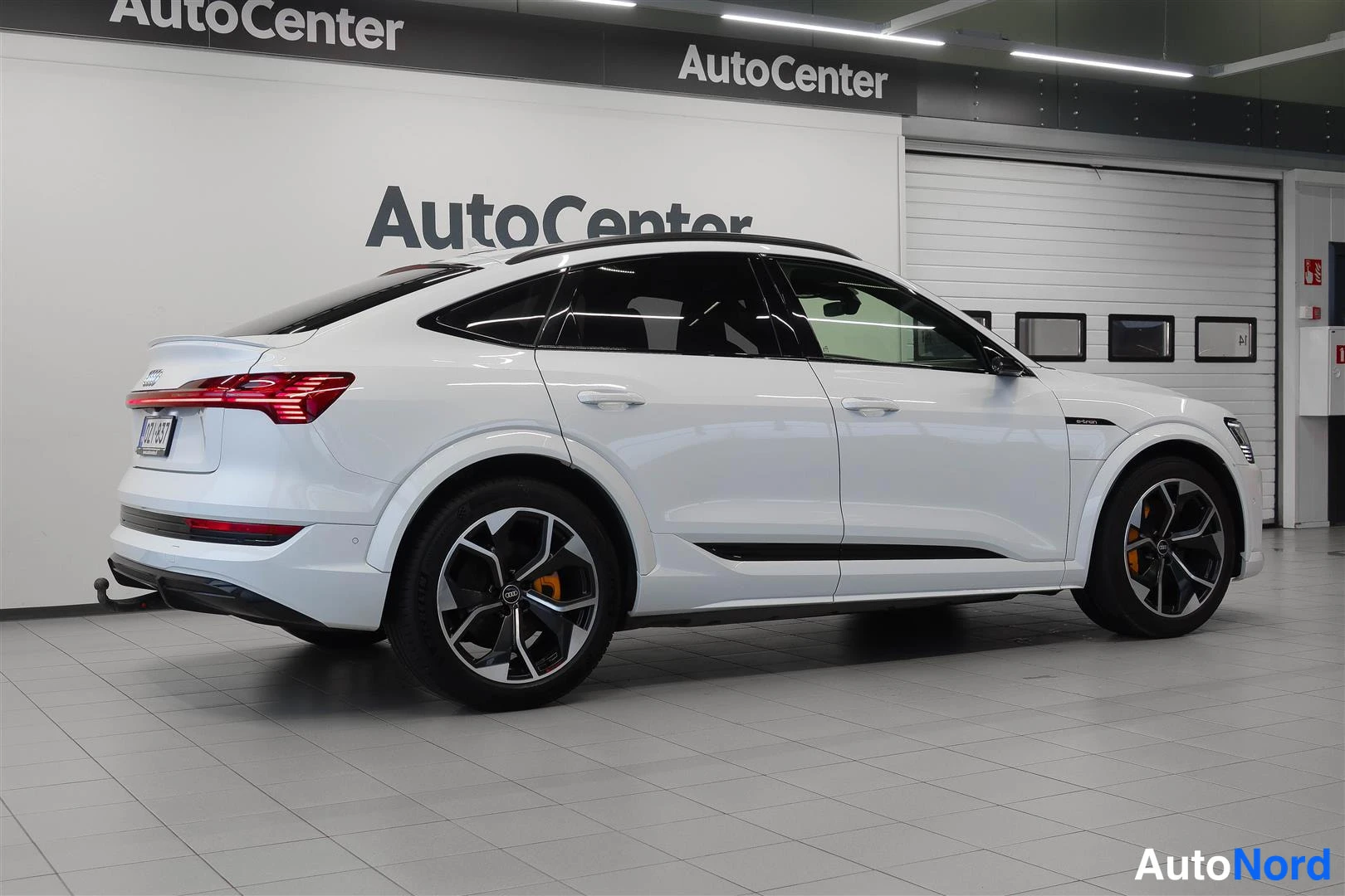 White Audi e-tron 2021, rear three-quarter, photo 8