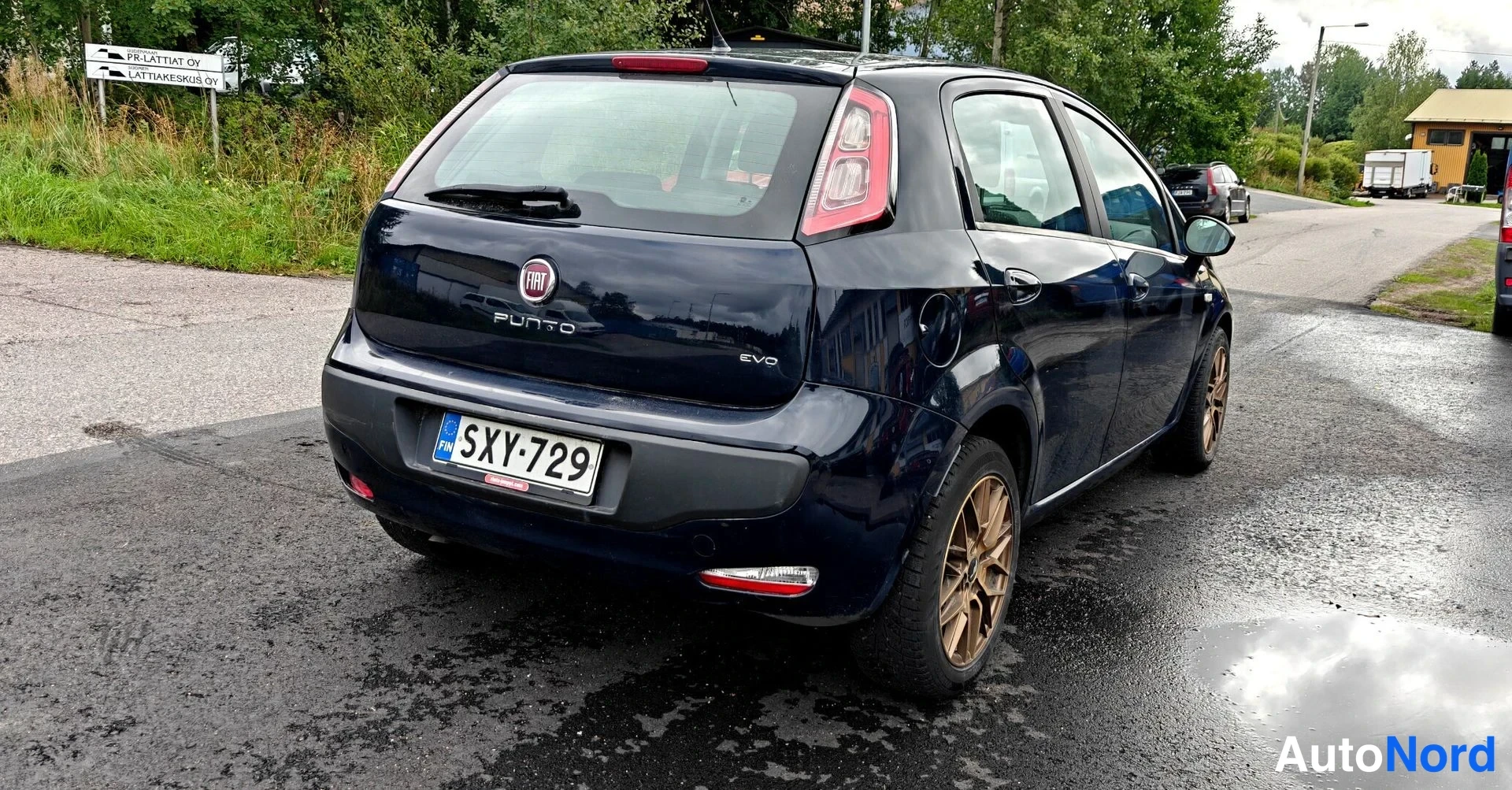 Sininen Fiat Punto Evo 2011, takaviisto, kuva 6