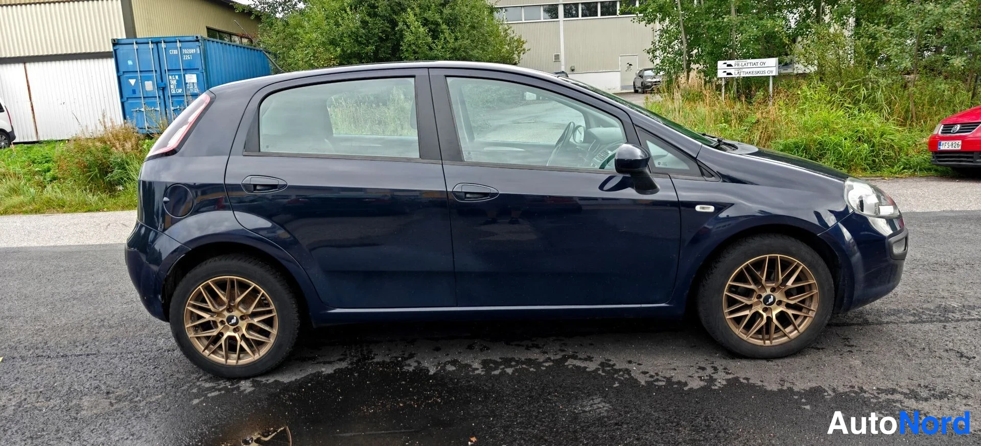 Sininen Fiat Punto Evo 2011, sivulta, kuva 3