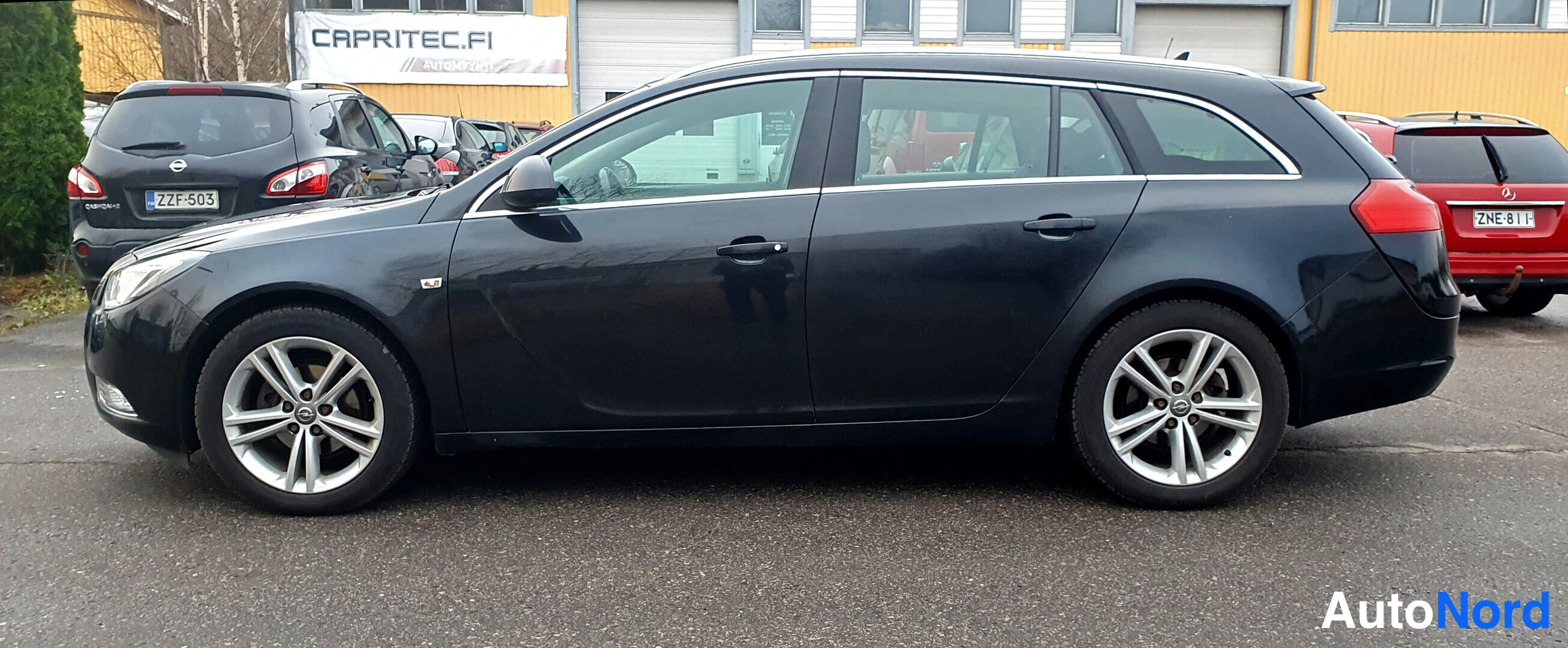 Musta Opel Insignia Sports Tourer 2013, takaviisto, kuva 6