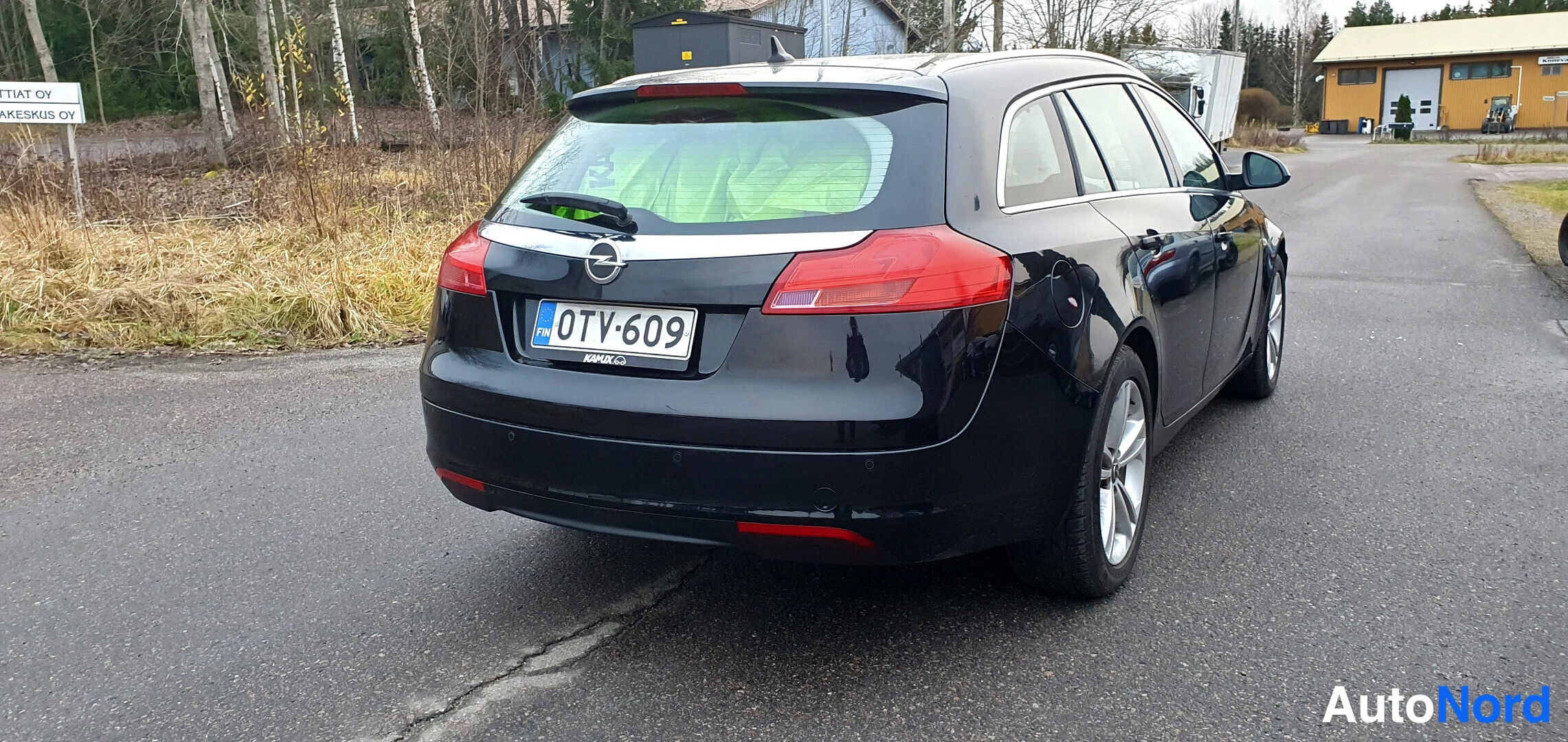 Musta Opel Insignia Sports Tourer 2013, takaviisto, kuva 8