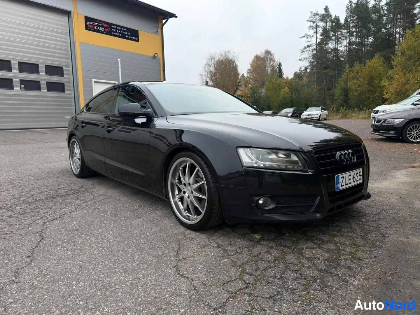 Musta Audi A5 Sportback 2011, etuviisto, keula oikealle, kuva 3