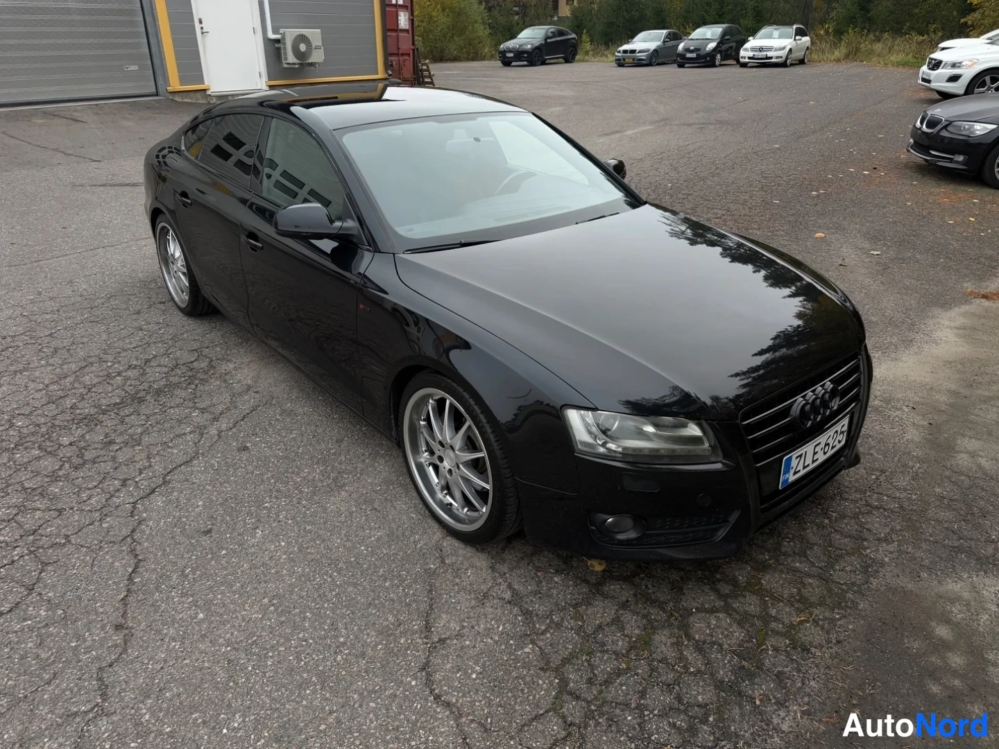Musta Audi A5 Sportback 2011, etuviisto, keula oikealle, kuva 2
