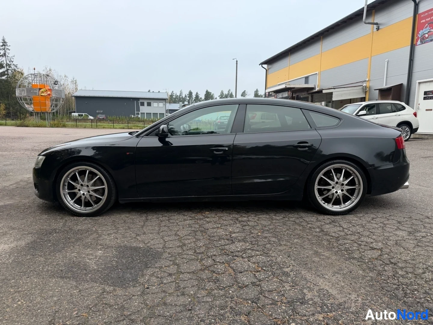 Musta Audi A5 Sportback 2011, sivulta, kuva 7