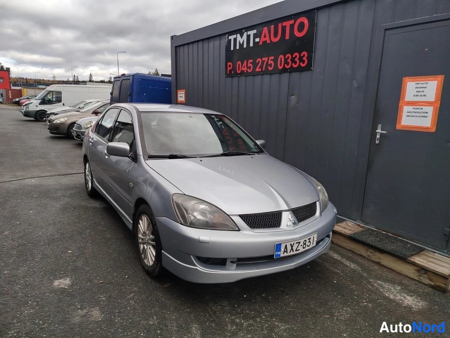 Hopea Mitsubishi Lancer 2004, etuviisto, keula oikealle, kuva 2