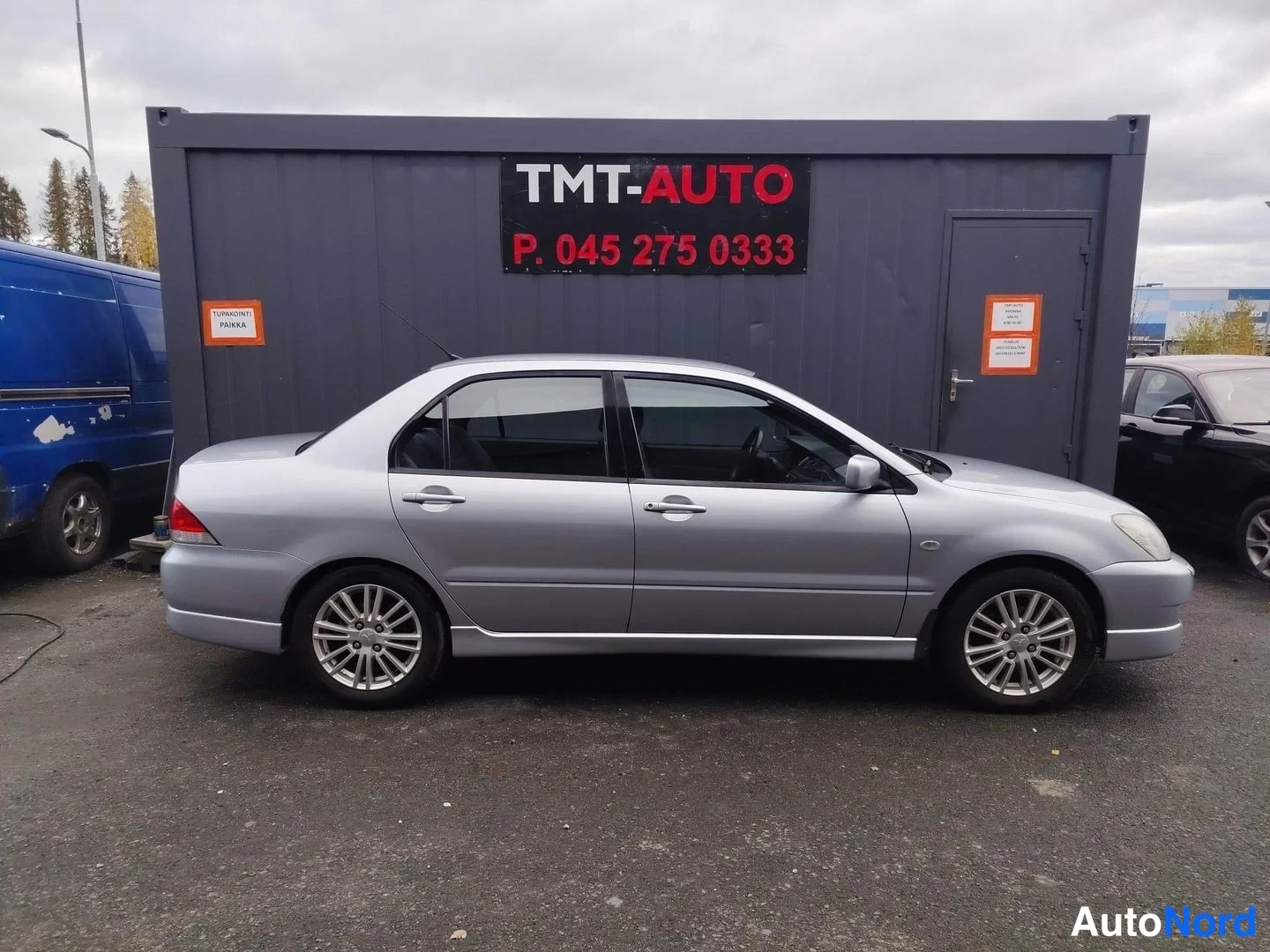 Hopea Mitsubishi Lancer 2004, etuviisto, keula oikealle, kuva 3