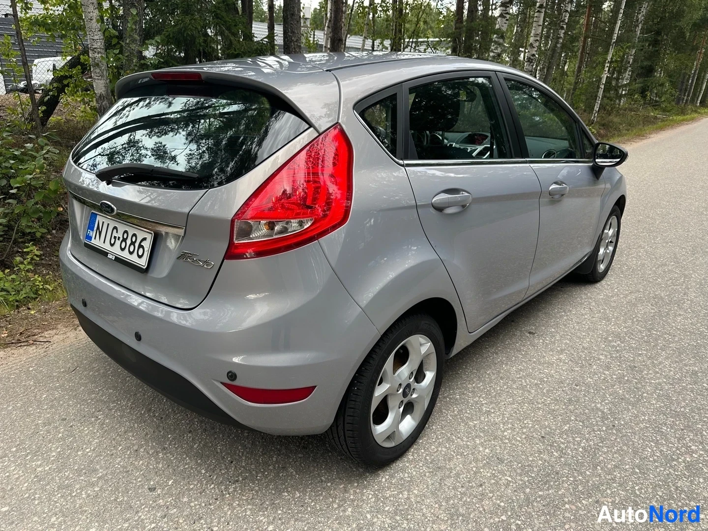 Grey Ford Fiesta 2011, rear three-quarter, photo 8