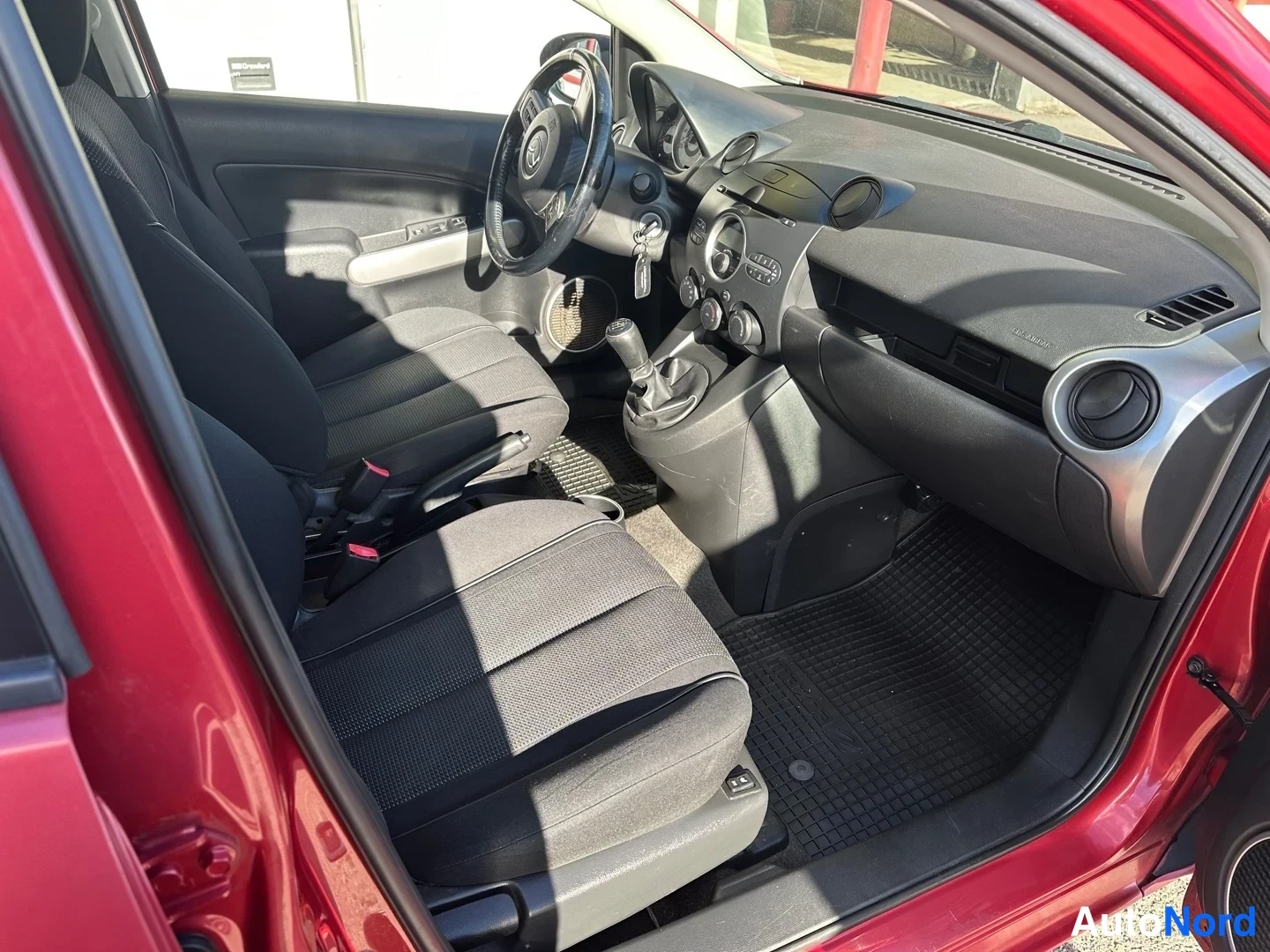 Red Mazda 2 2008, side, photo 6