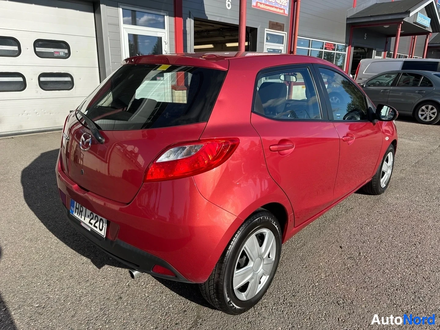 Red Mazda 2 2008, rear three-quarter, photo 10