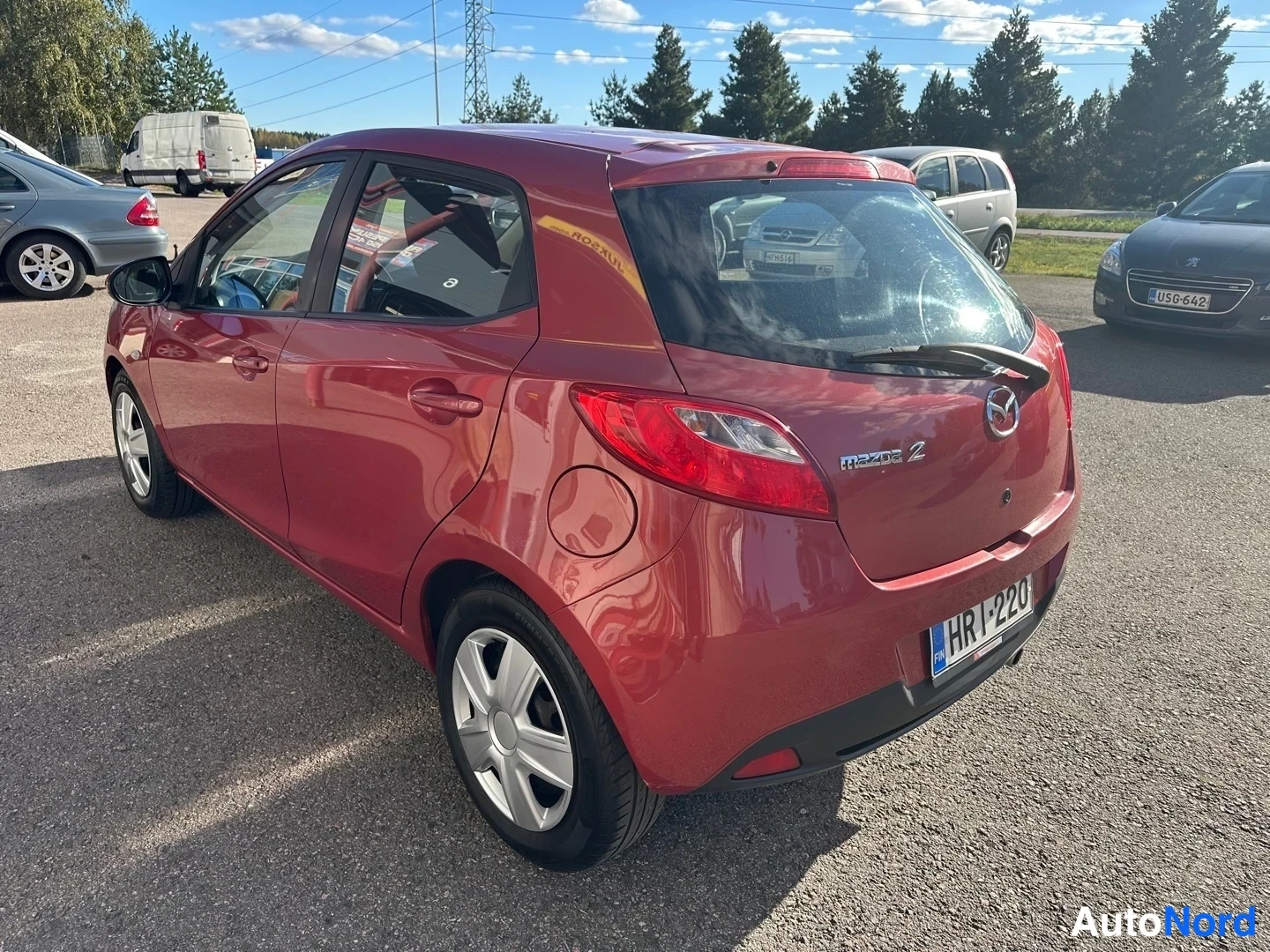Red Mazda 2 2008, rear three-quarter, photo 11