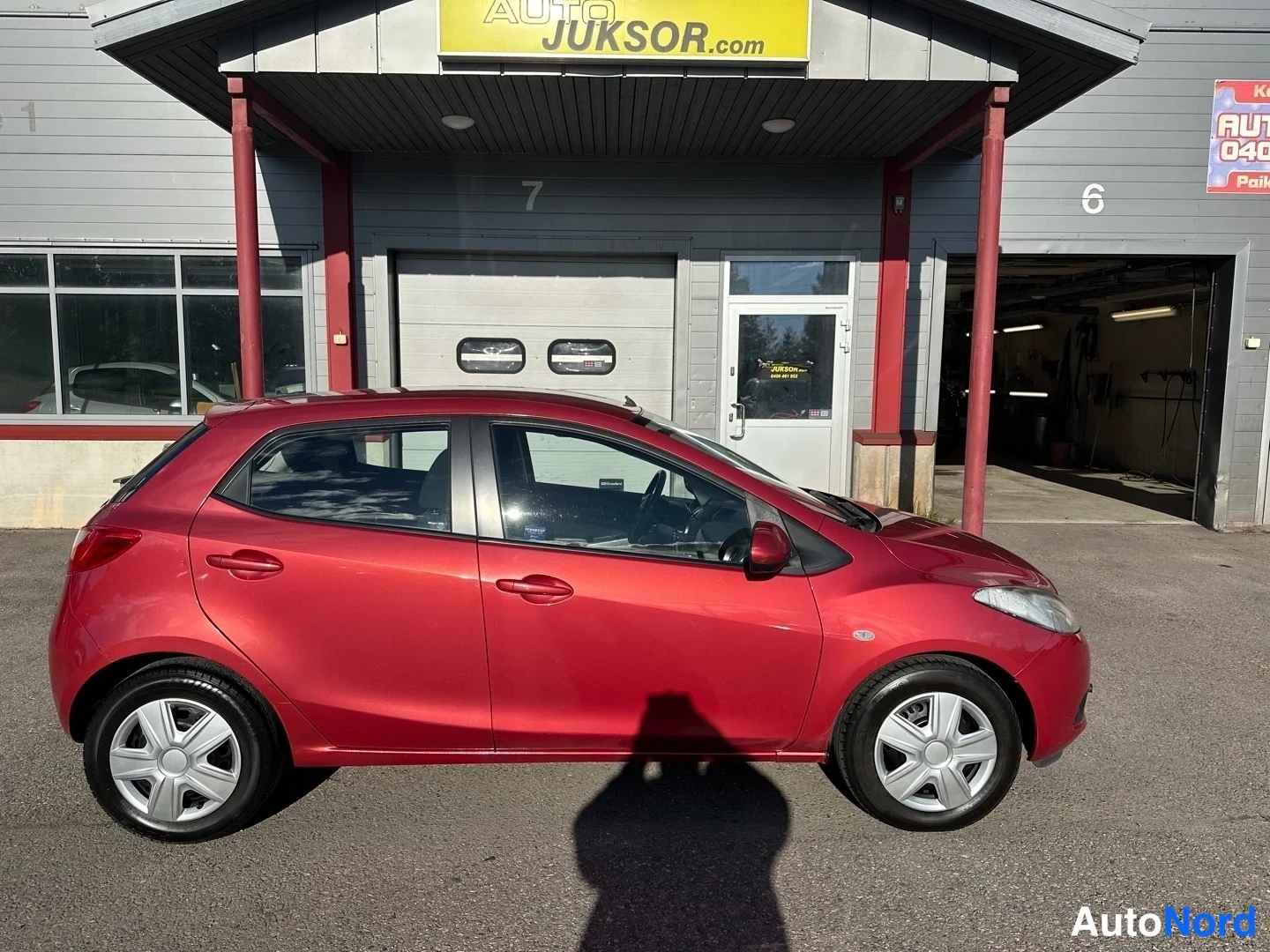 Red Mazda 2 2008, side, photo 7