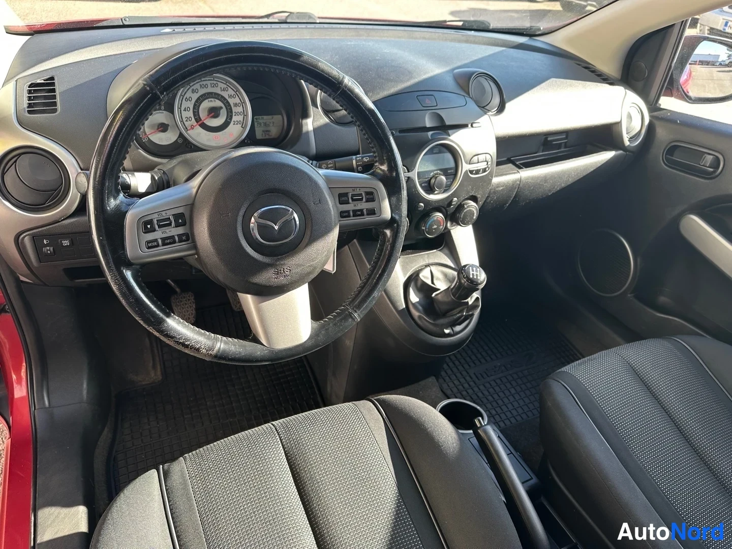 Red Mazda 2 2008, front, photo 5