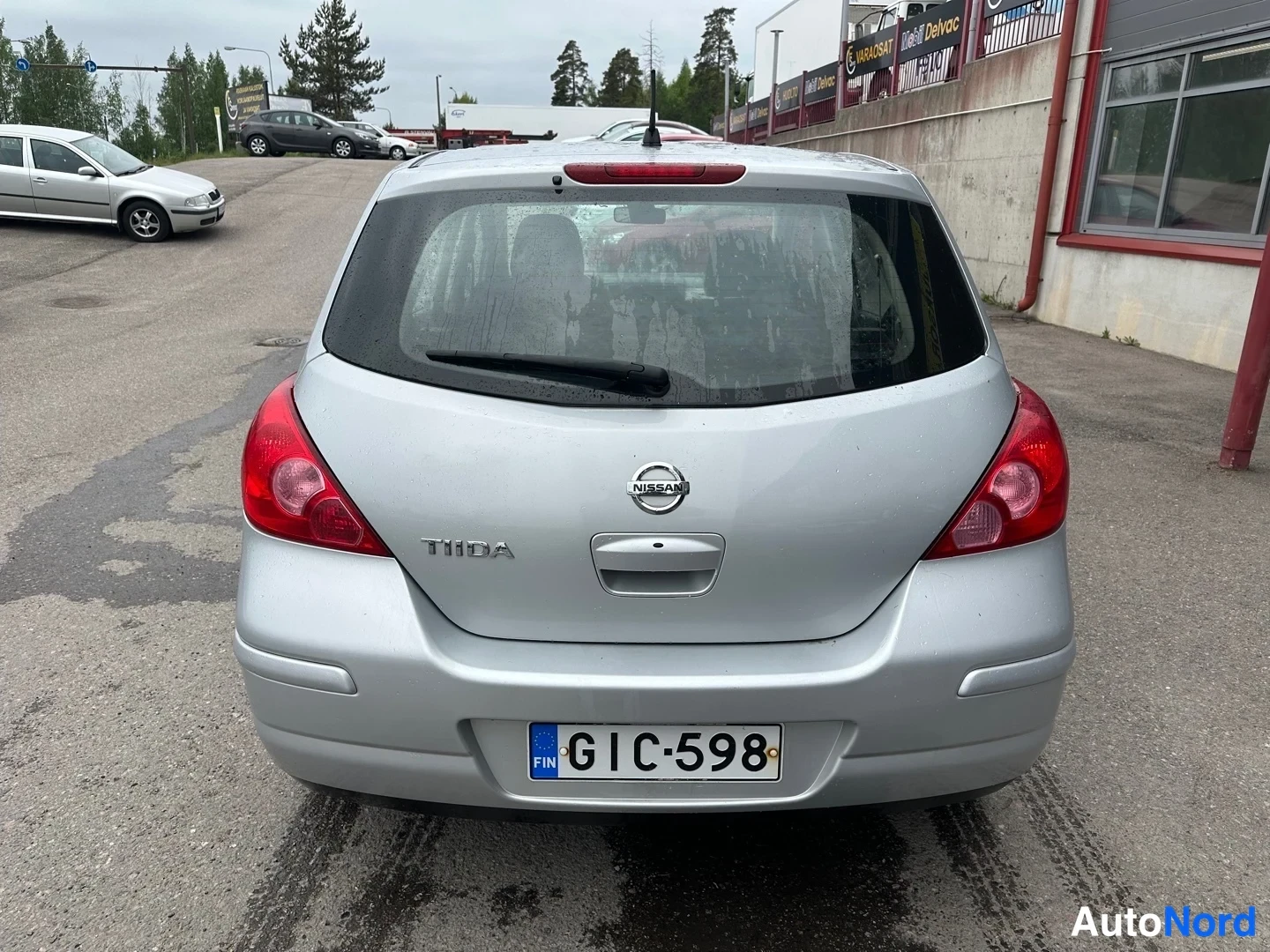Grey Nissan Tiida 2008, rear, photo 10