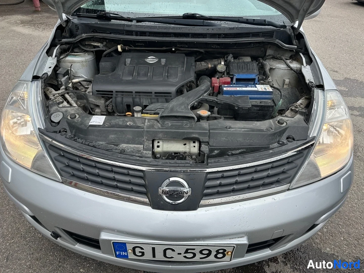 Grey Nissan Tiida 2008, front, photo 3