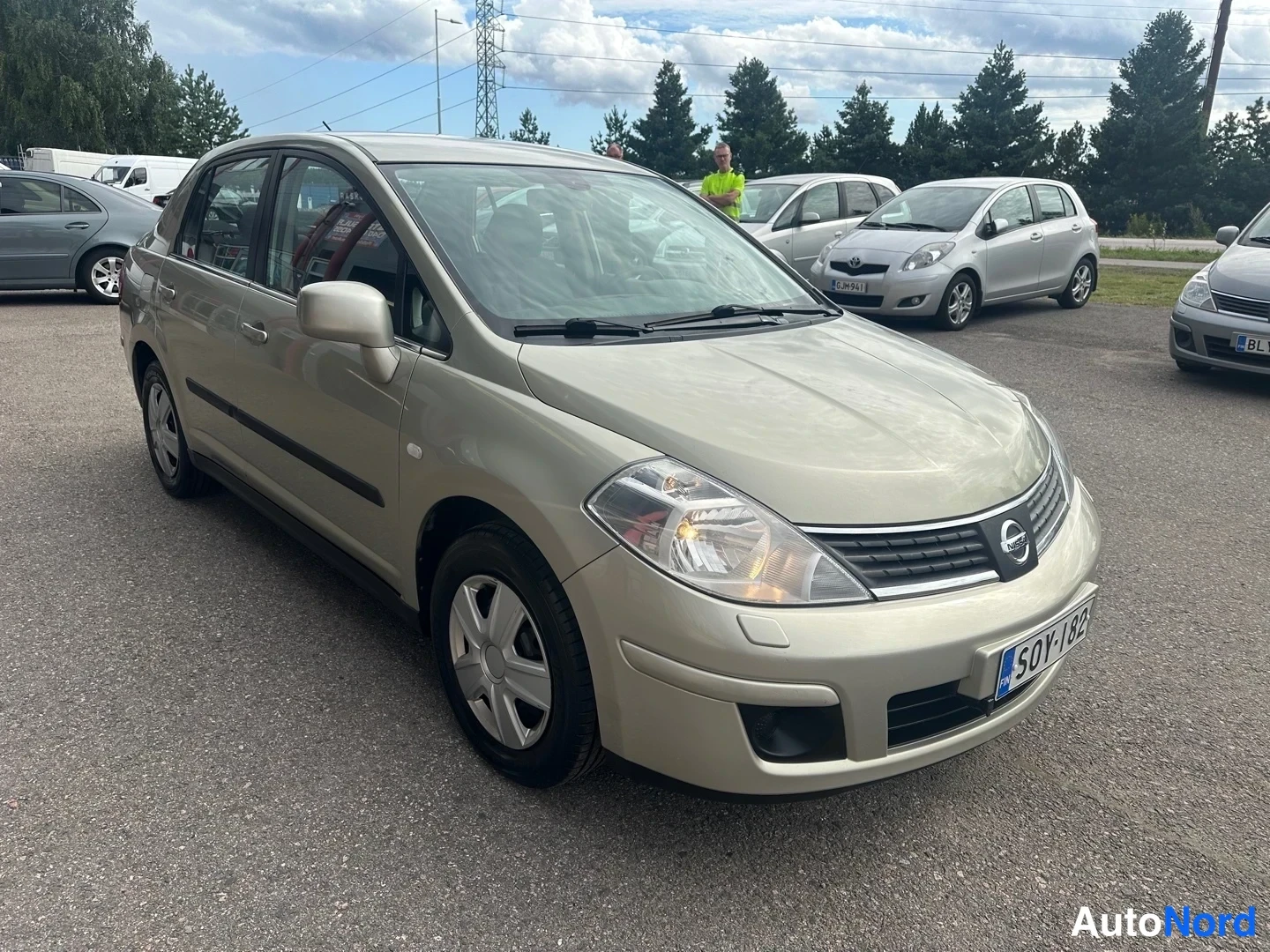 Beige Nissan Tiida 2007, rear three-quarter, photo 9