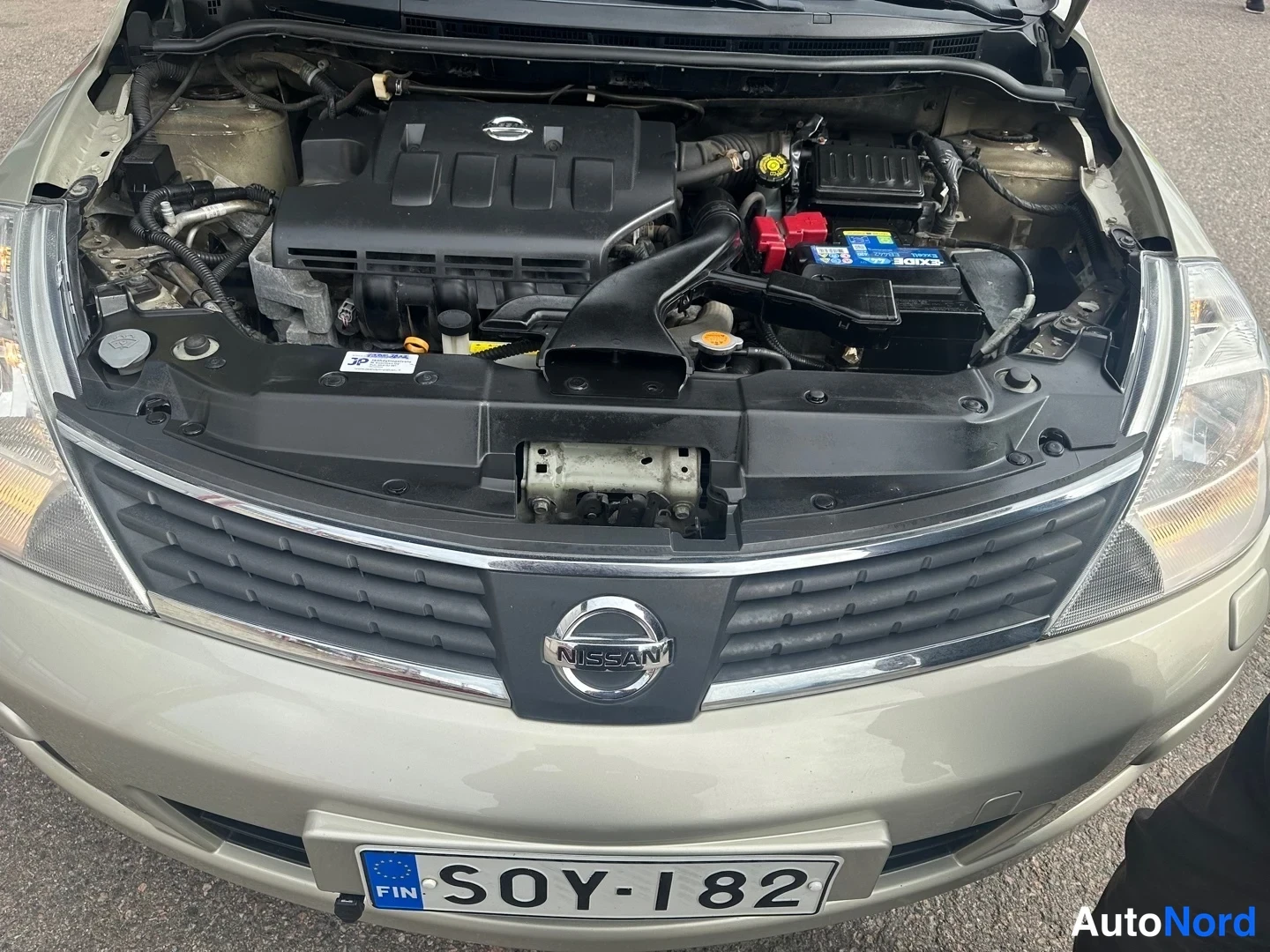 Beige Nissan Tiida 2007, front, photo 3