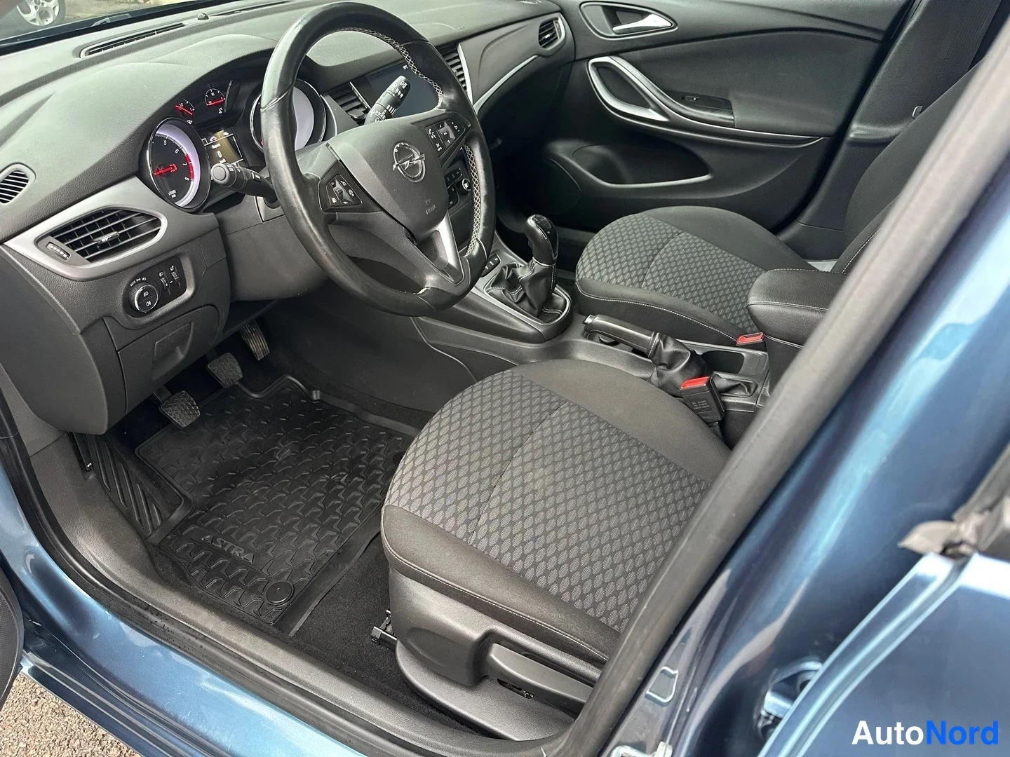 Blue Opel Astra 2016, side, photo 8