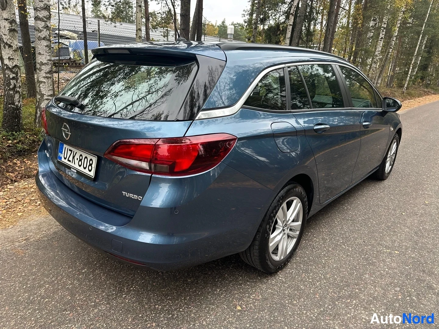 Blue Opel Astra 2016, rear three-quarter, photo 12