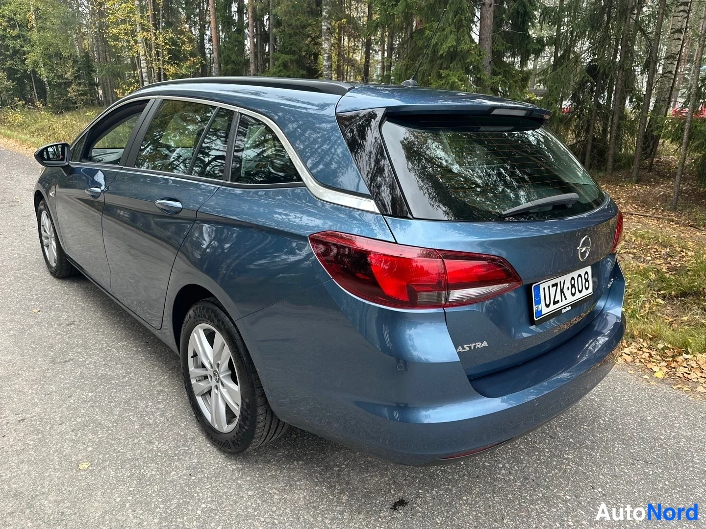 Blue Opel Astra 2016, rear three-quarter, photo 13