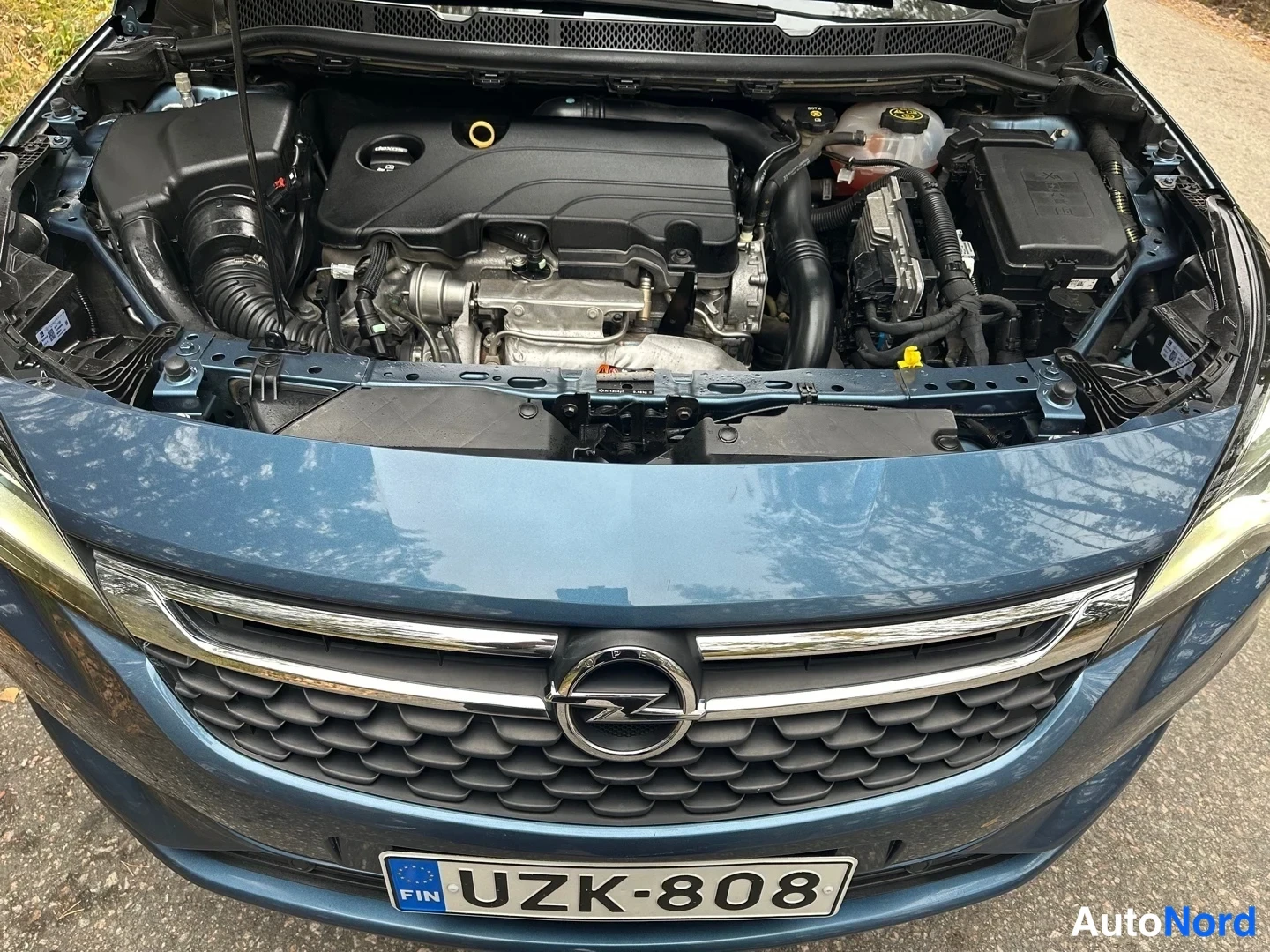 Blue Opel Astra 2016, front, photo 4