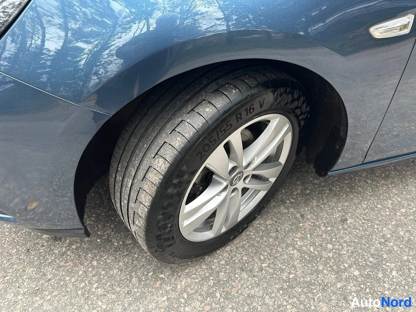 Blue Opel Astra 2016, side, photo 11