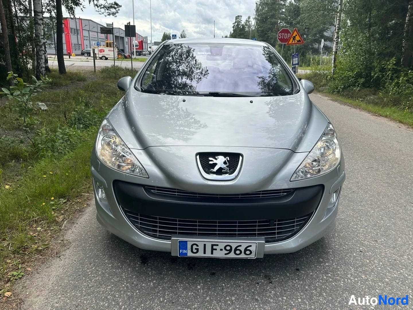 Silver Peugeot 308 2008, front, photo 4