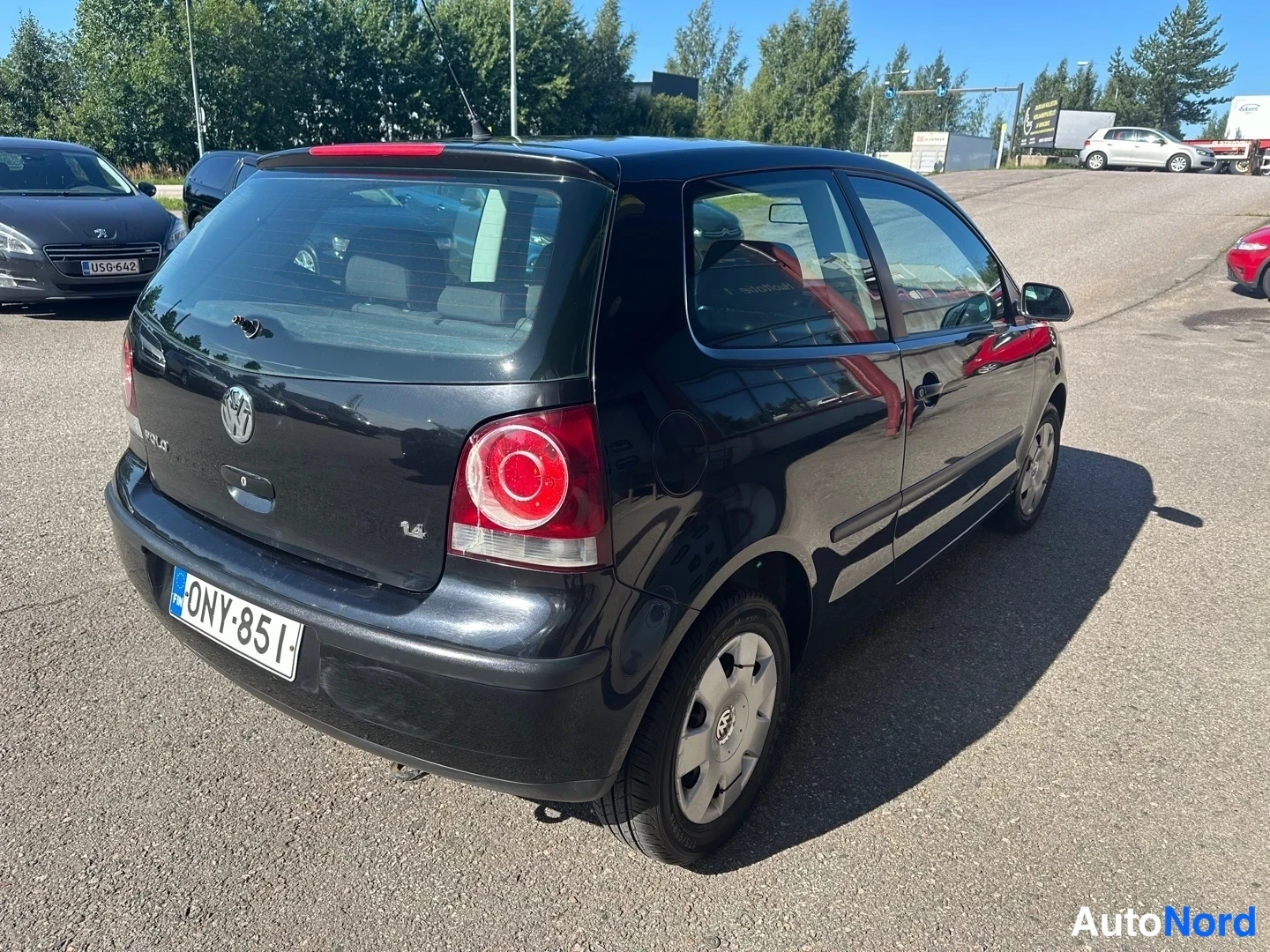 Black Volkswagen Polo 2007, rear three-quarter, photo 9