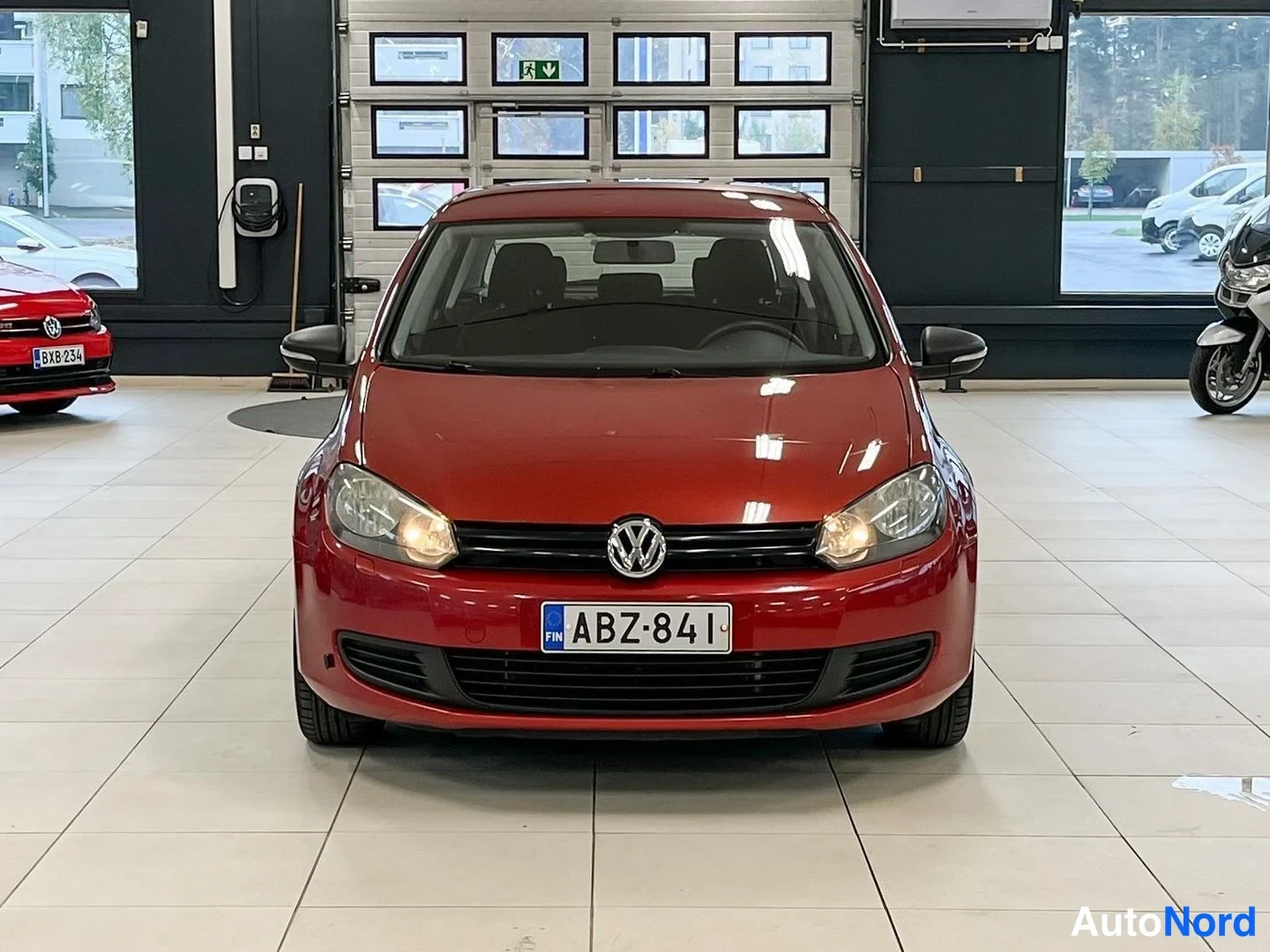 Red Volkswagen Golf Trendline 2009, front, photo 4
