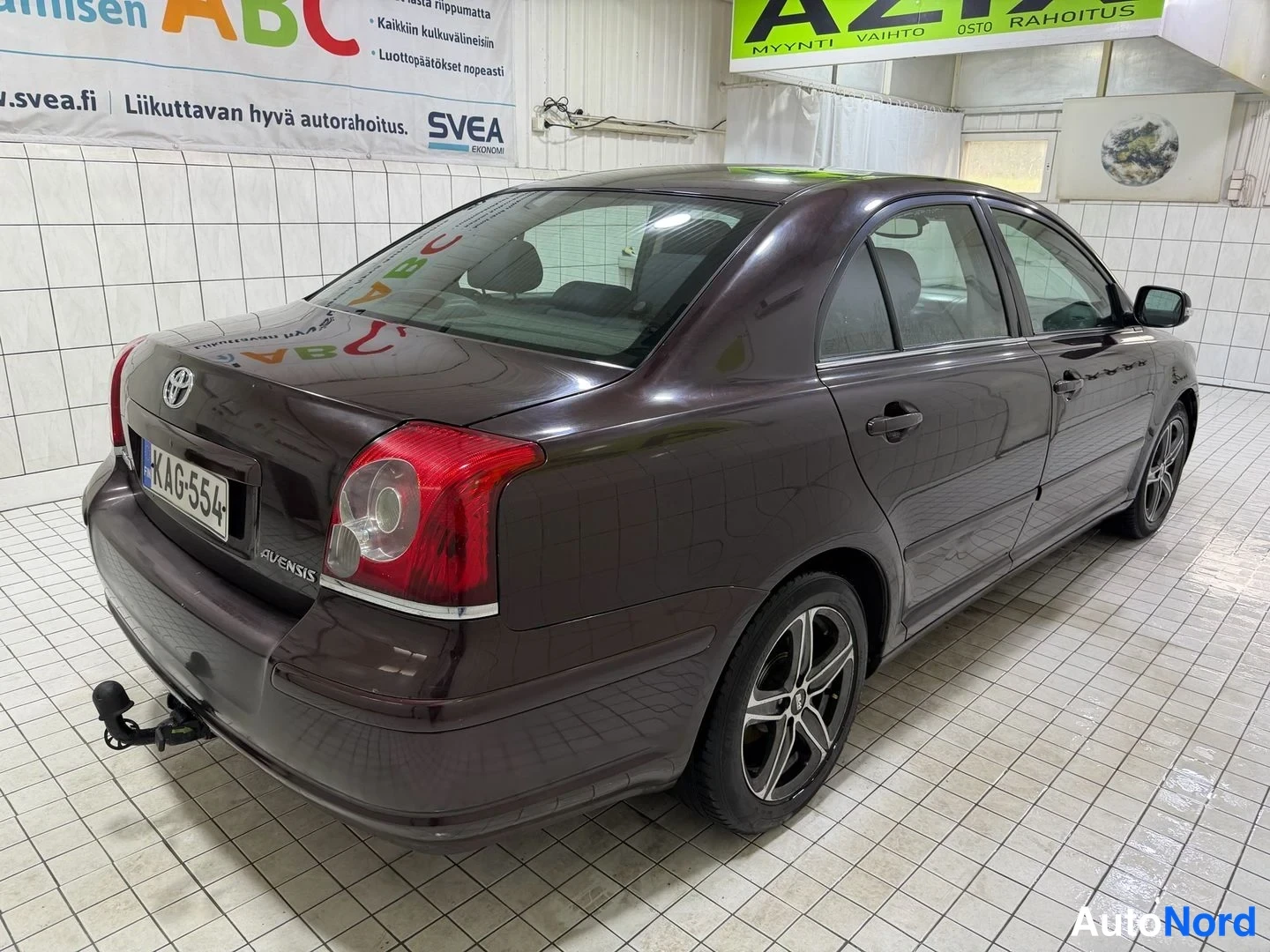 Ruskea Toyota Avensis 2007, takaviisto, kuva 10
