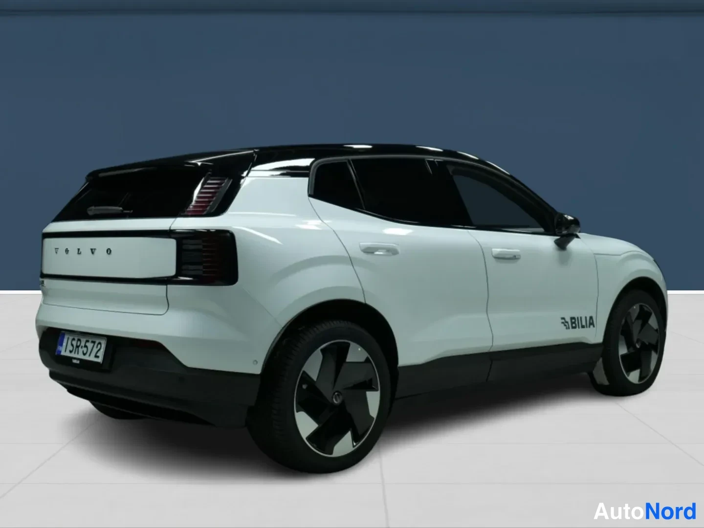 White Volvo EX30 2026, rear three-quarter, photo 4