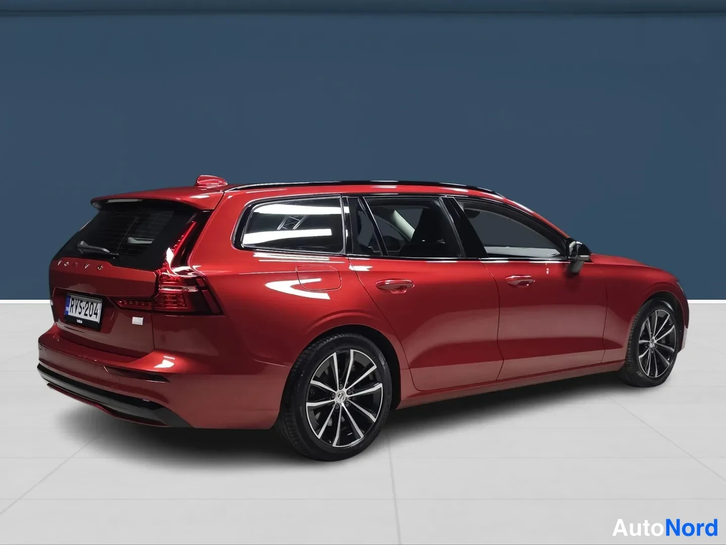 Red Volvo V60 2024, rear three-quarter, photo 4