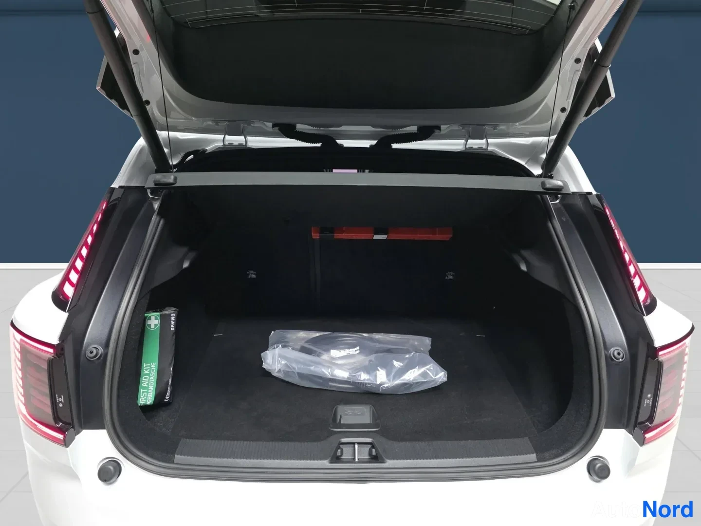 White Volvo EX30 2026, rear, photo 7