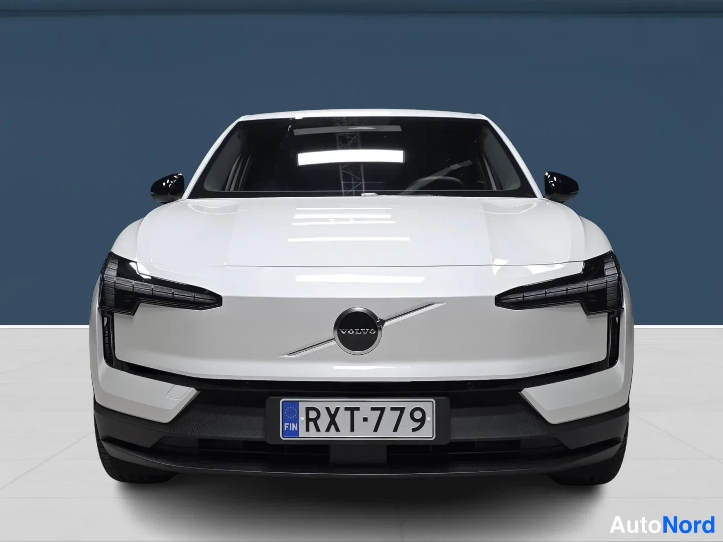 White Volvo EX30 2026, front, photo 3