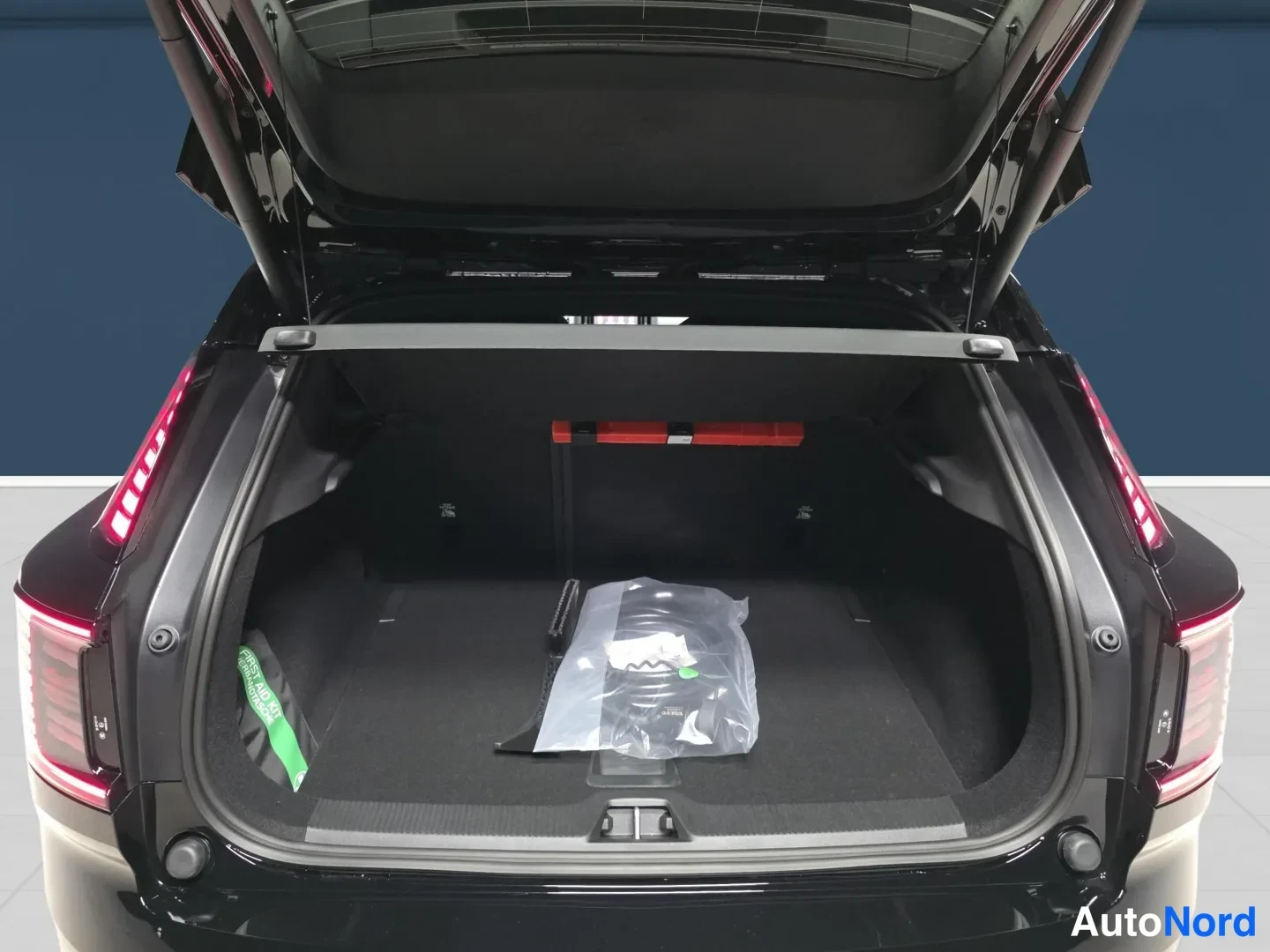Black Volvo EX30 2027, rear, photo 7