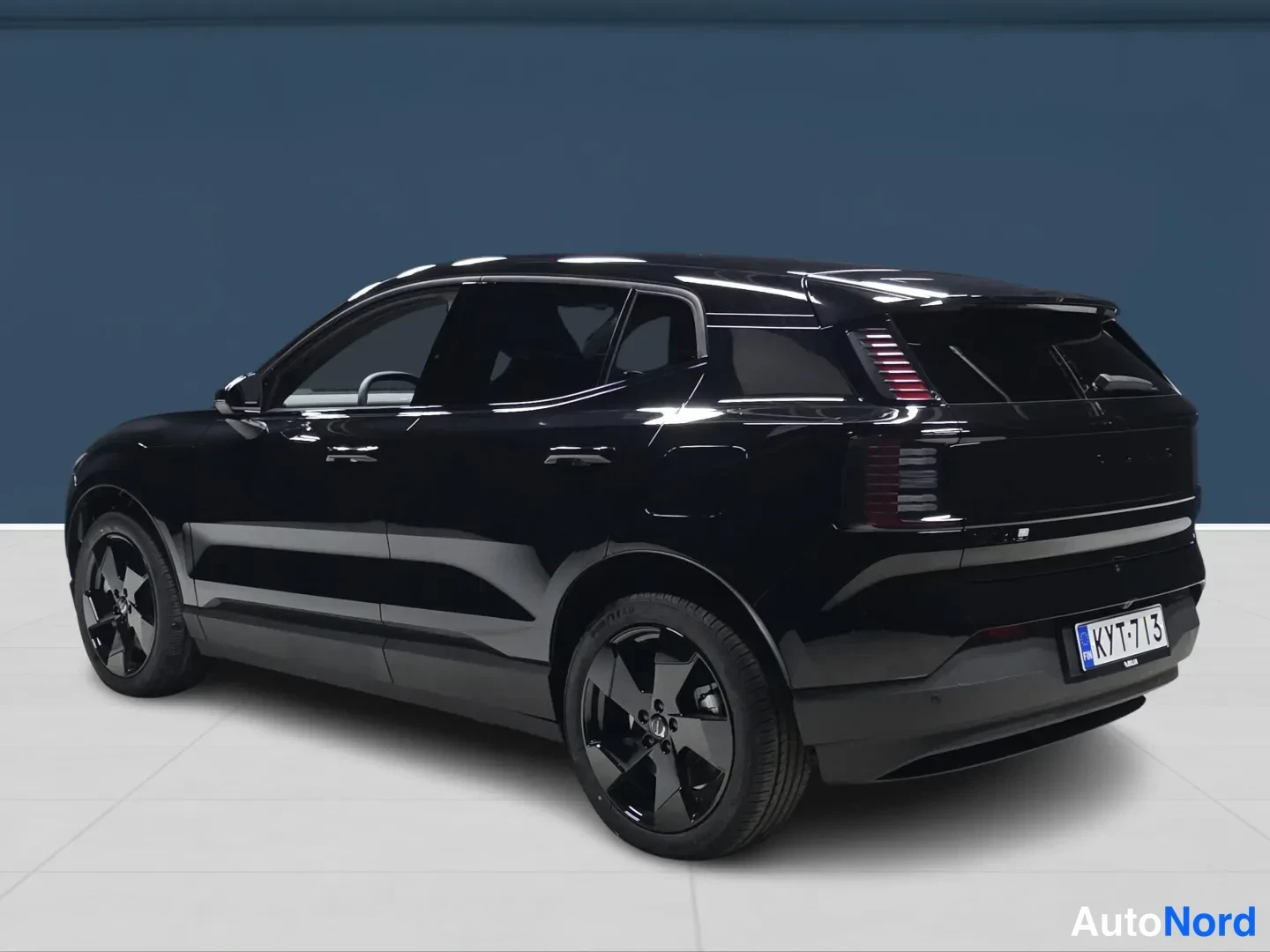Black Volvo EX30 2027, rear three-quarter, photo 5