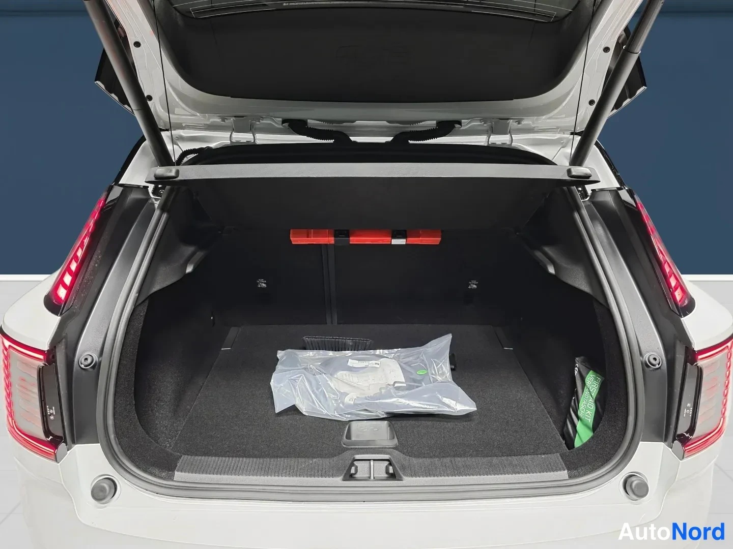 White Volvo EX30 2027, rear, photo 7