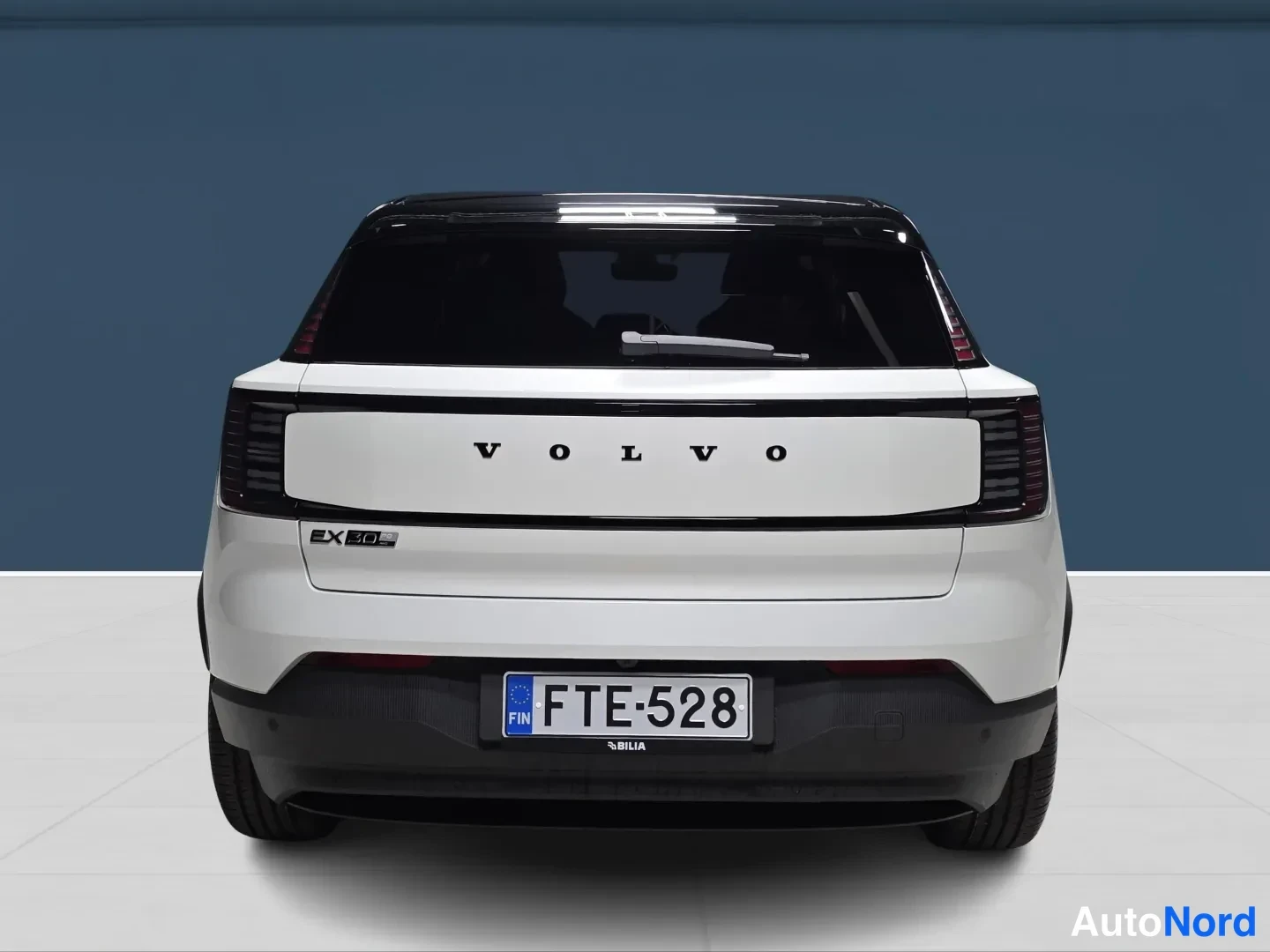 White Volvo EX30 2027, rear, photo 6