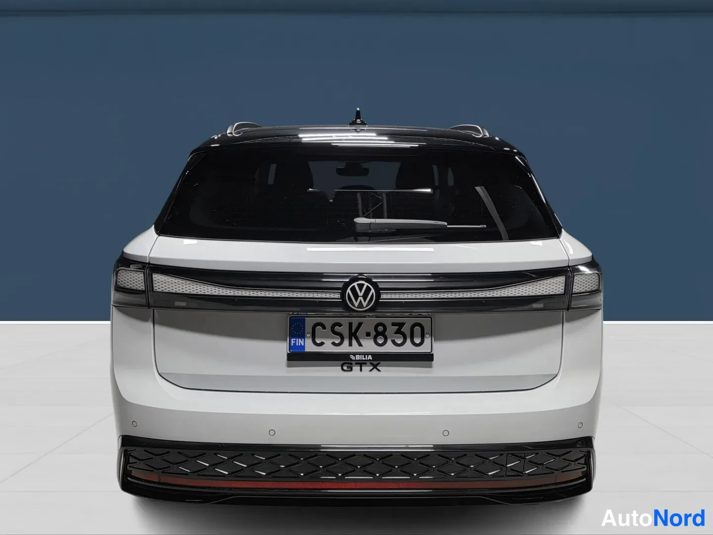 White Volkswagen ID.7 2025, rear, photo 6
