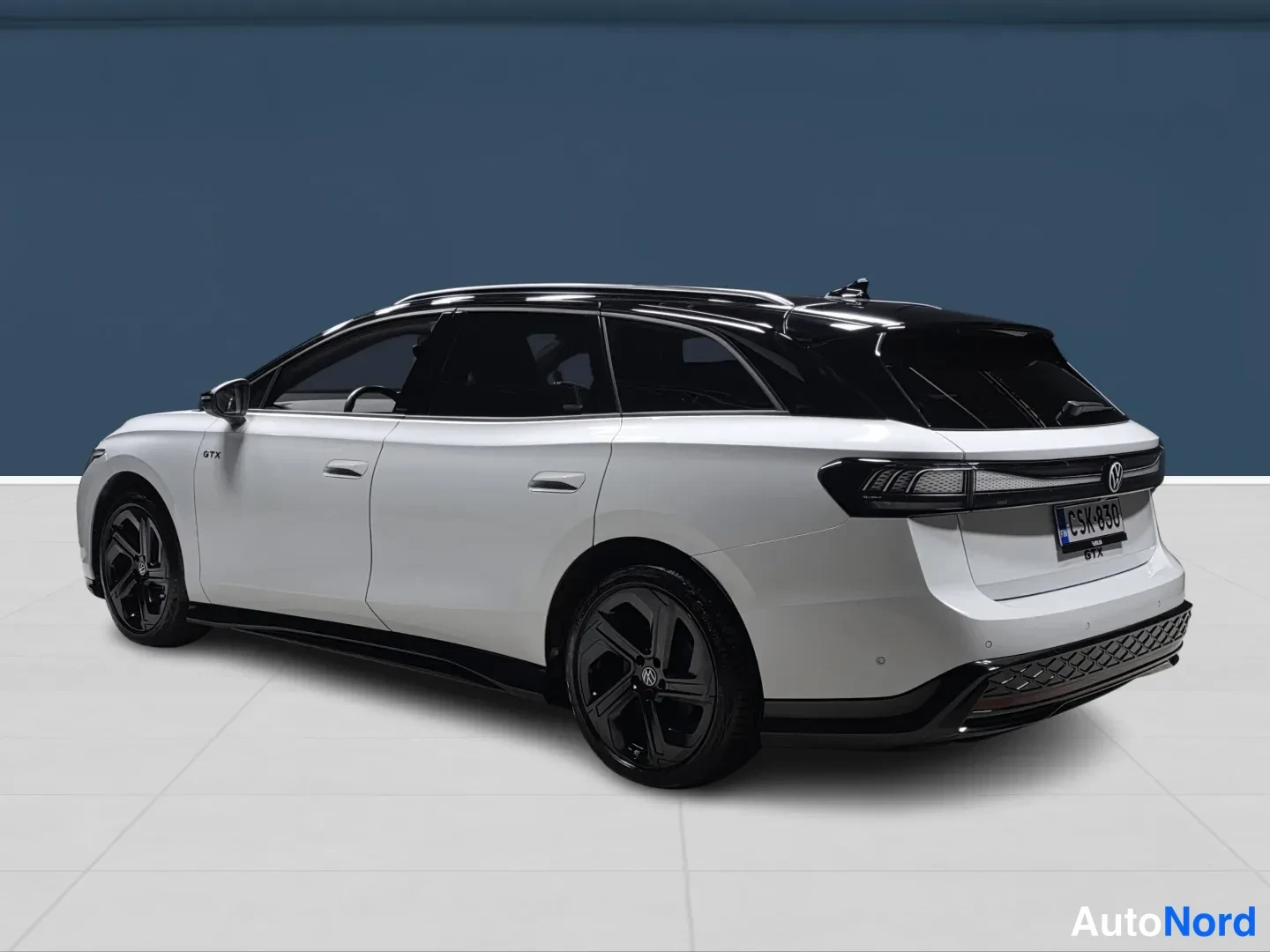 White Volkswagen ID.7 2025, rear three-quarter, photo 5