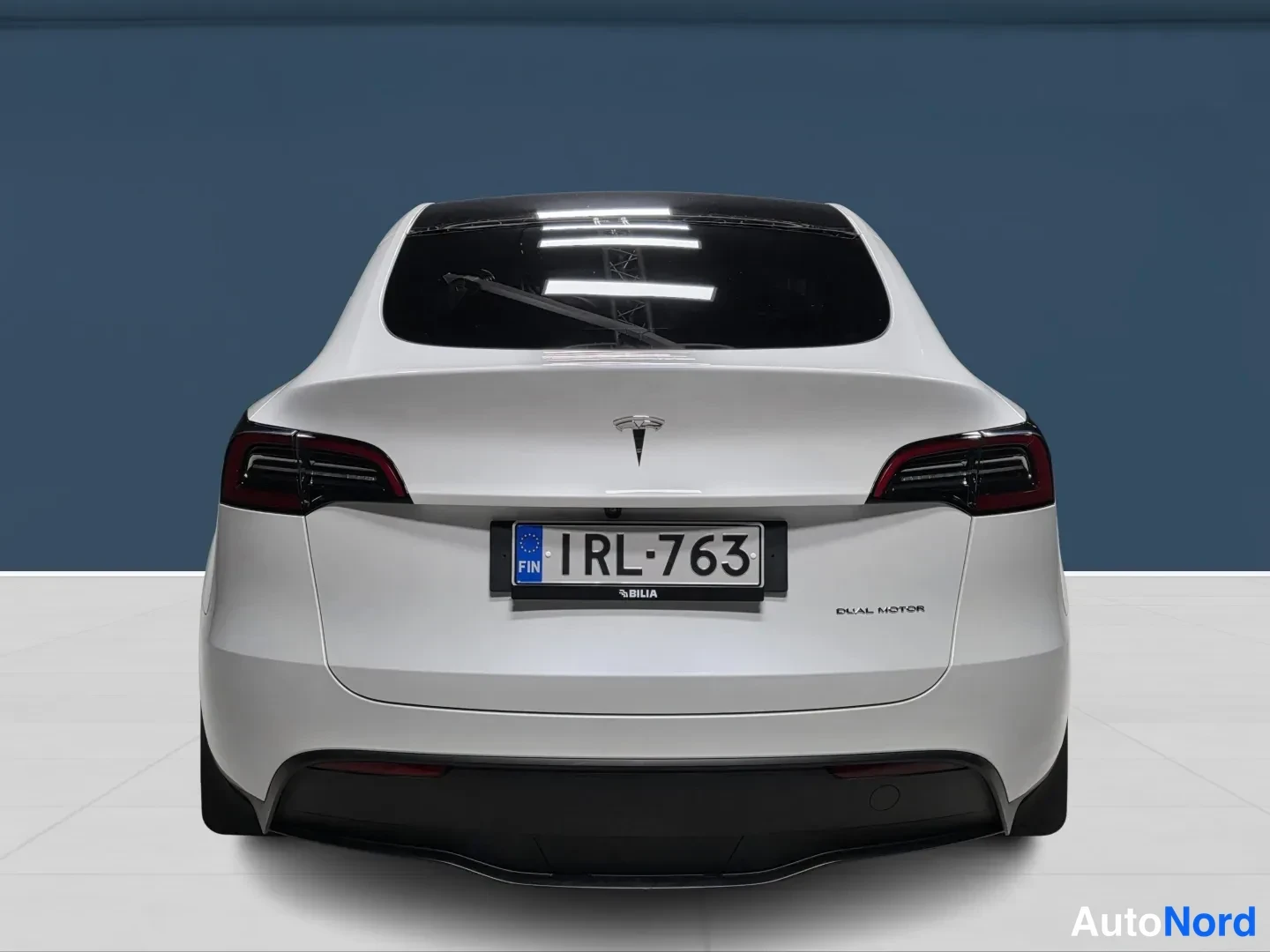 White Tesla Model Y 2023, rear, photo 6