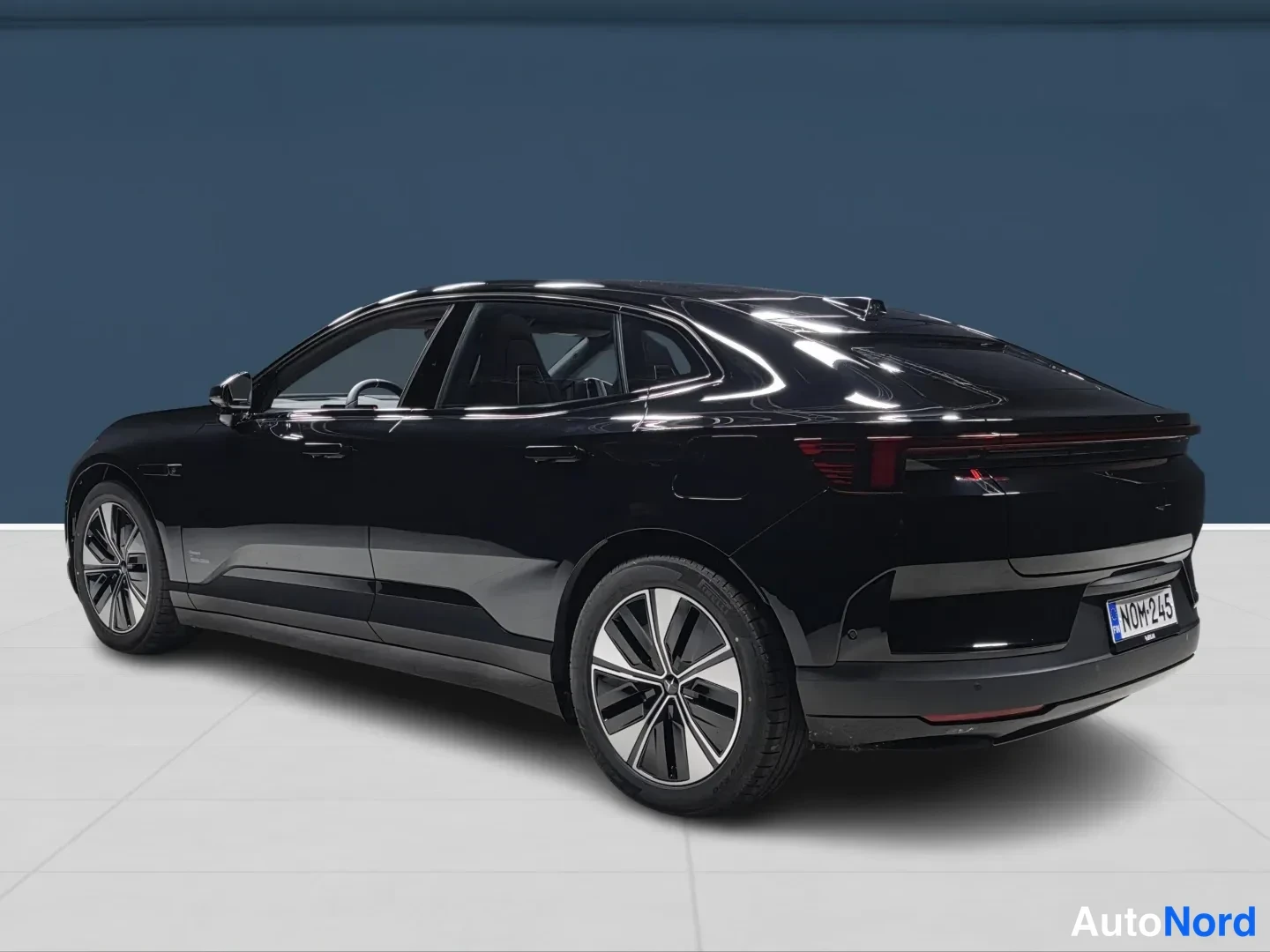 Black Polestar 4 2026, rear three-quarter, photo 5