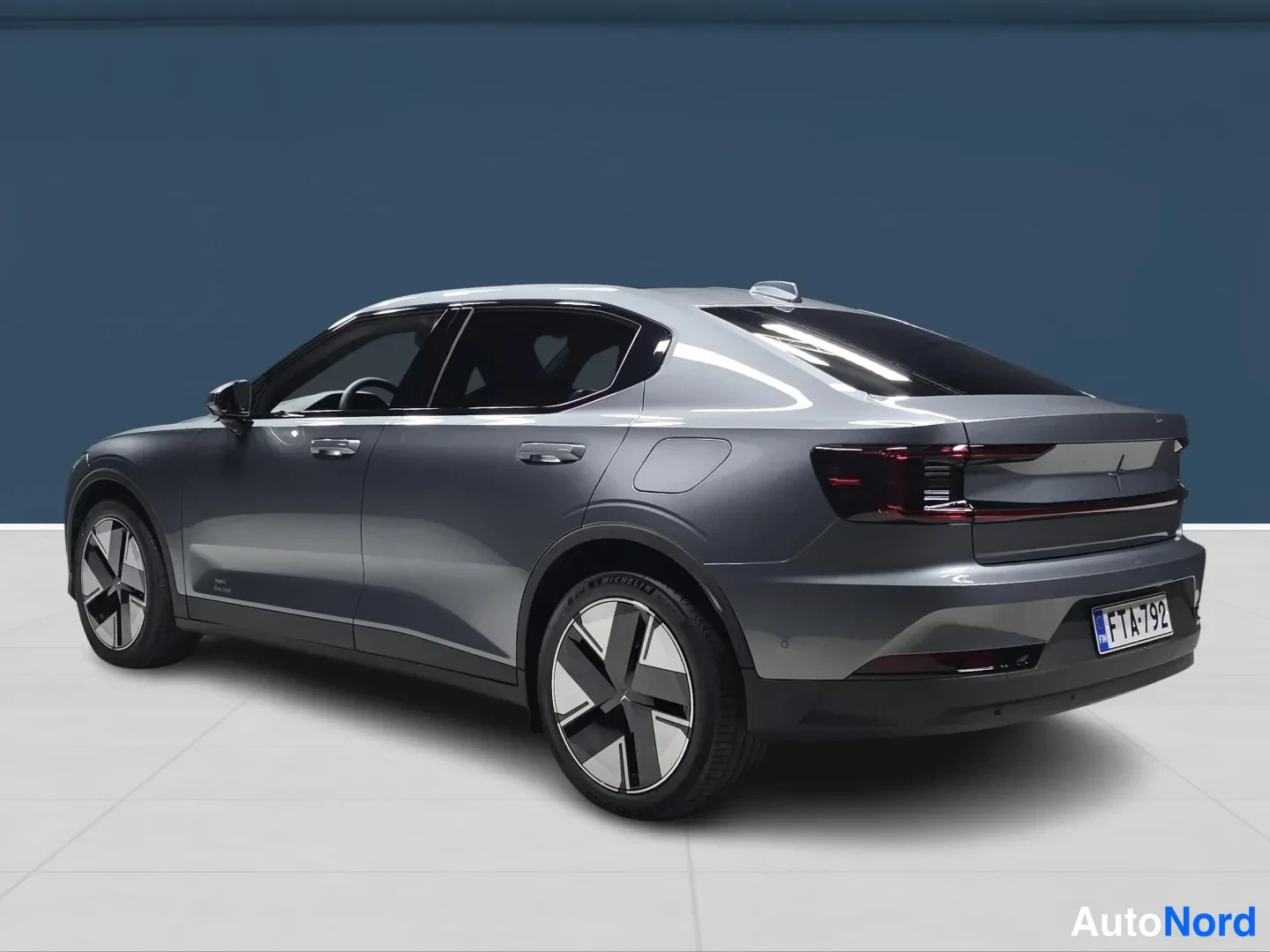 Grey Polestar 2 2026, rear three-quarter, photo 4