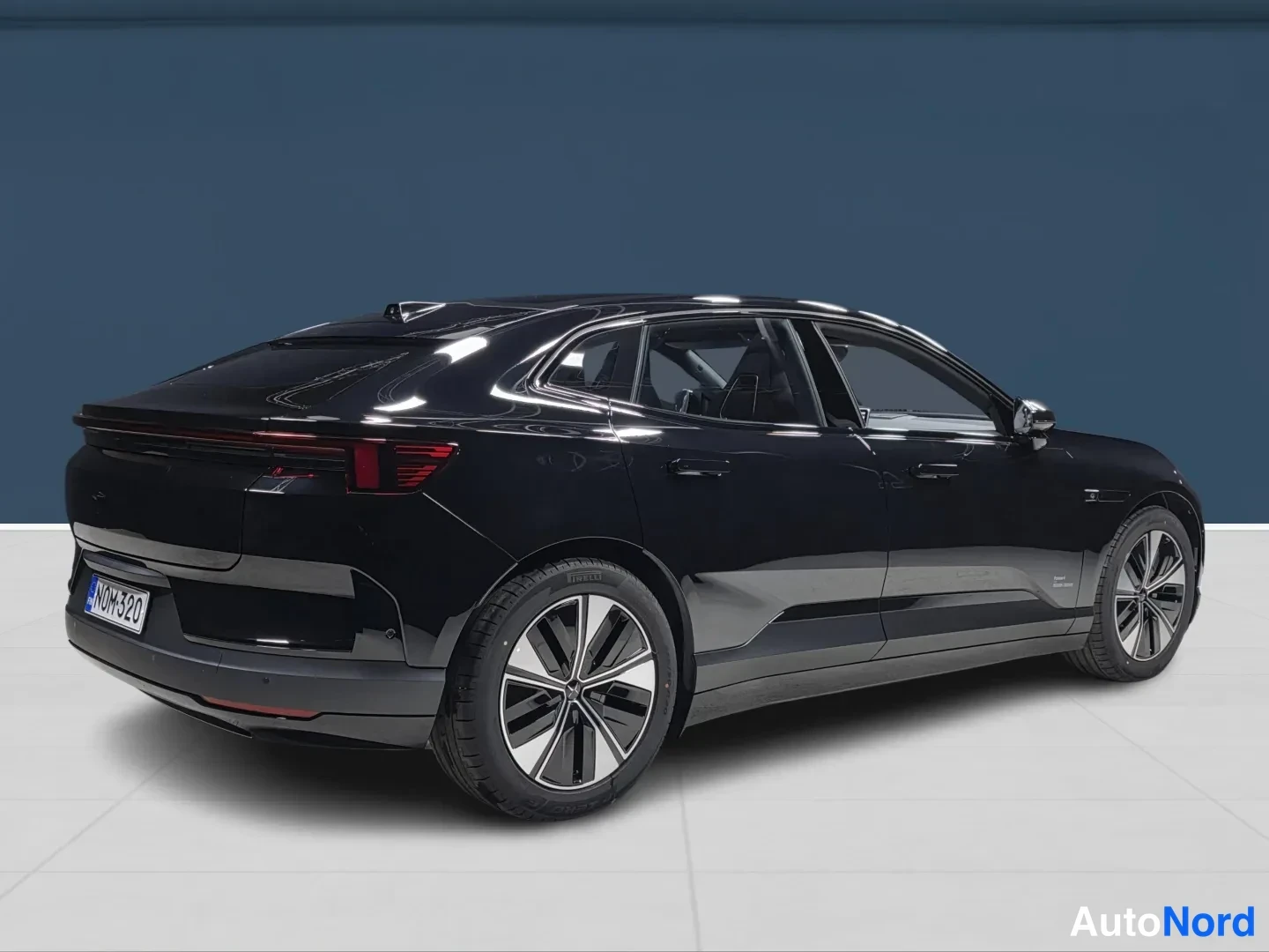 Black Polestar 4 2026, rear three-quarter, photo 4