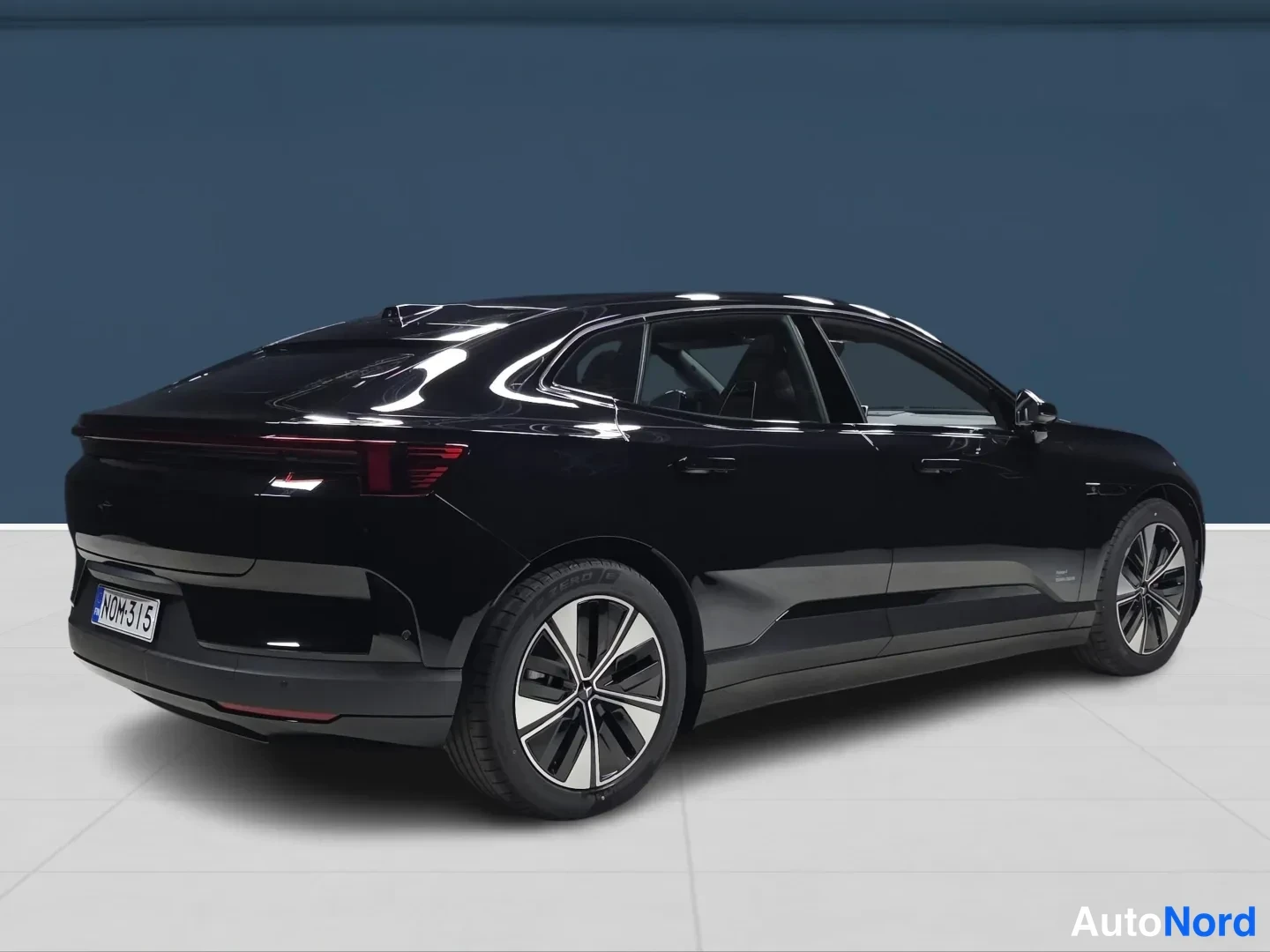 Black Polestar 4 2026, rear three-quarter, photo 4