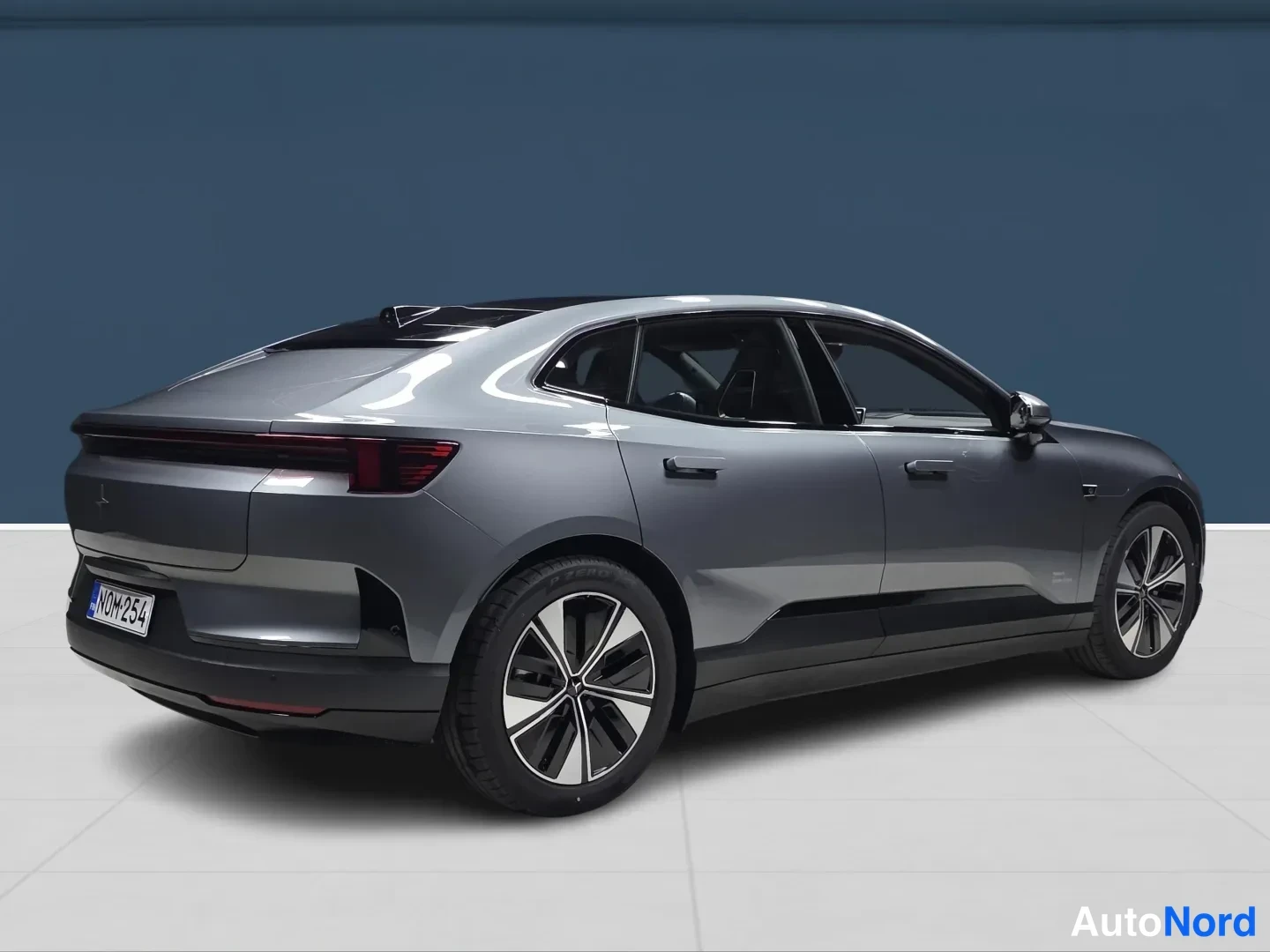 Grey Polestar 4 2026, rear three-quarter, photo 4