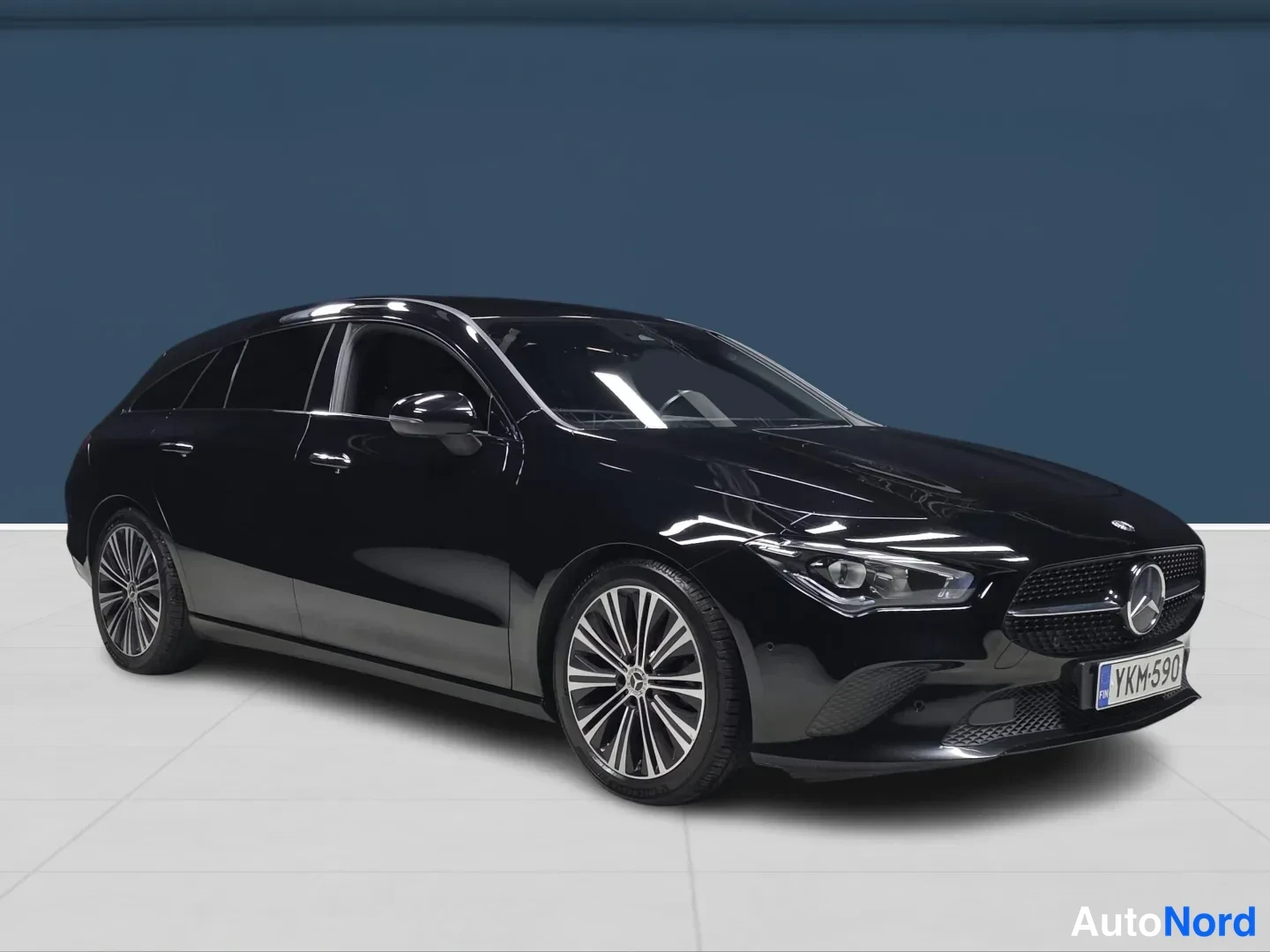 Black Mercedes-Benz CLA 2020, front three-quarter, nose to the right, photo 2