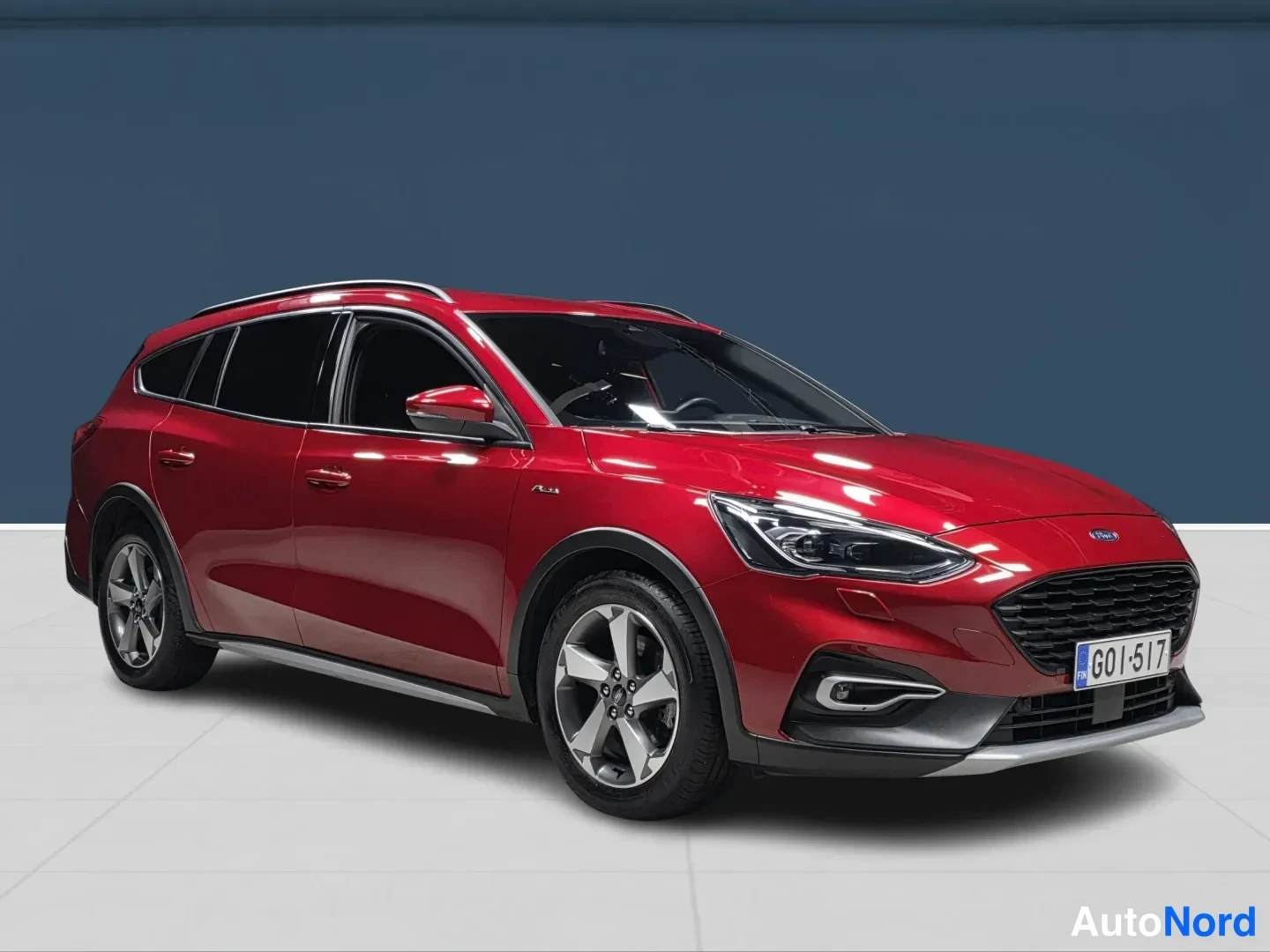 Red Ford Focus 2020, front three-quarter, nose to the right, photo 2